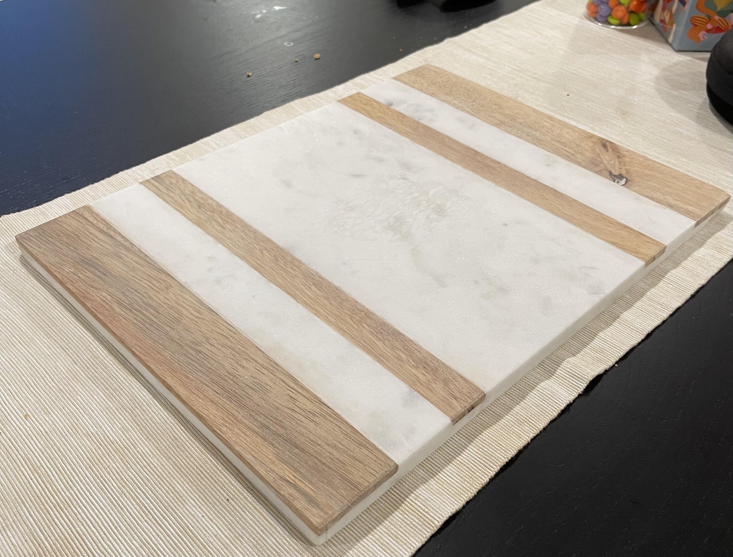 Price dropped from 17 to 4.29 for this wood/marble serving board r/aldi