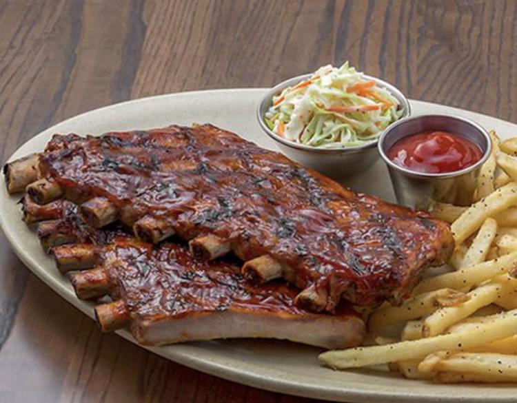 How much food is half a rack of ribs at Tony Romas? What is in the