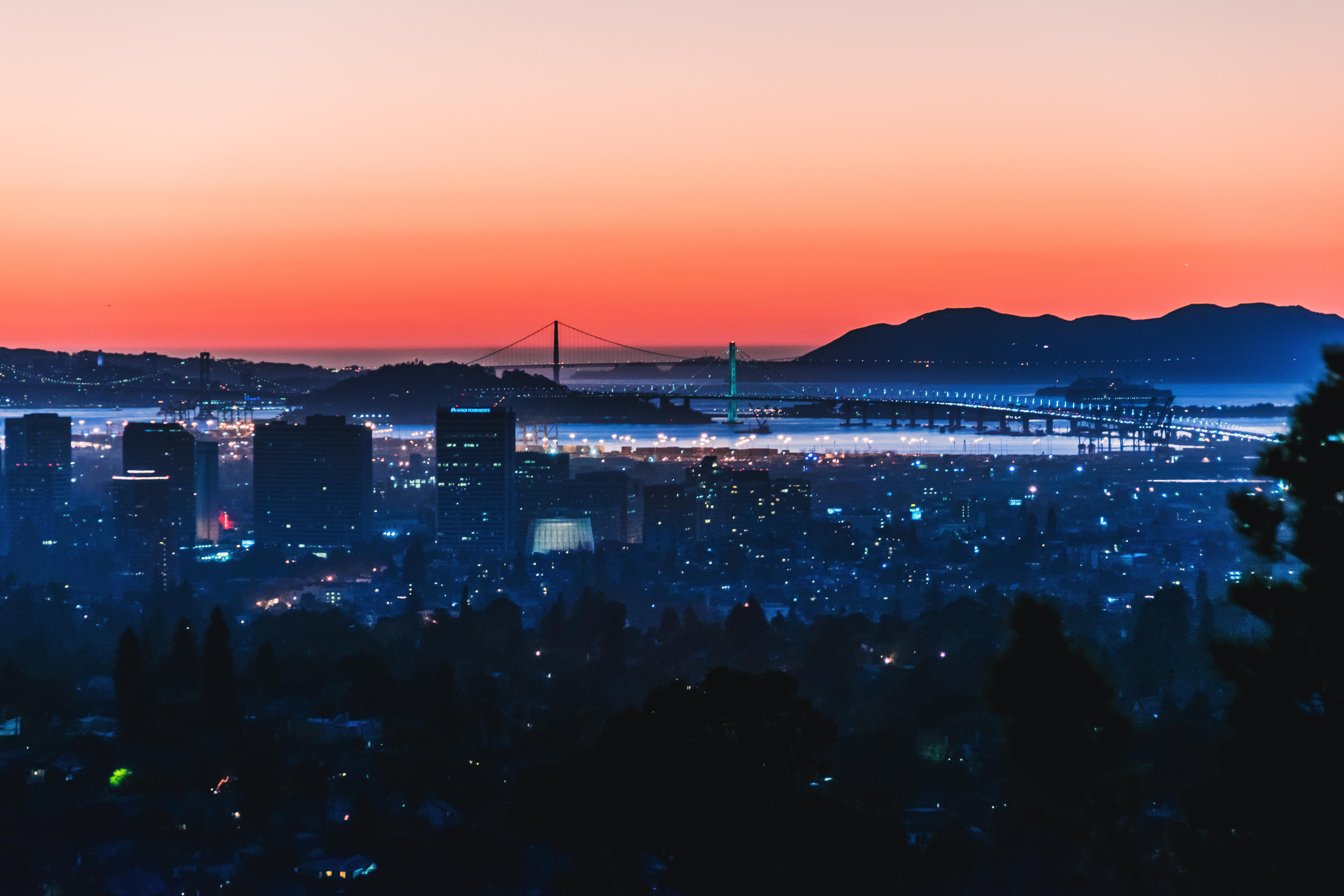sunset at the bay area with both bay bridge and golden gate r/pic