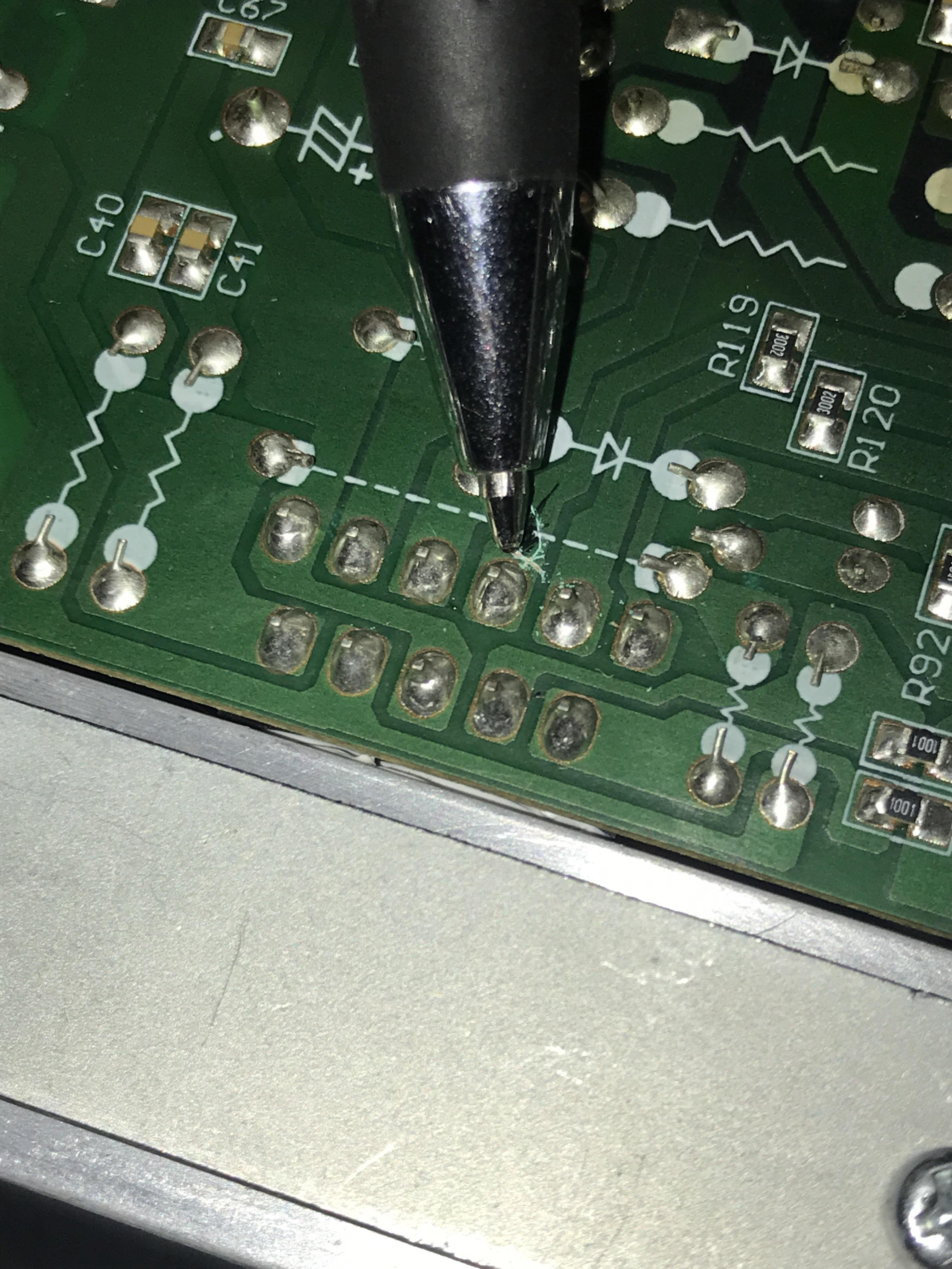 How do I remove this pin from the circuit board? It’s the mute signal