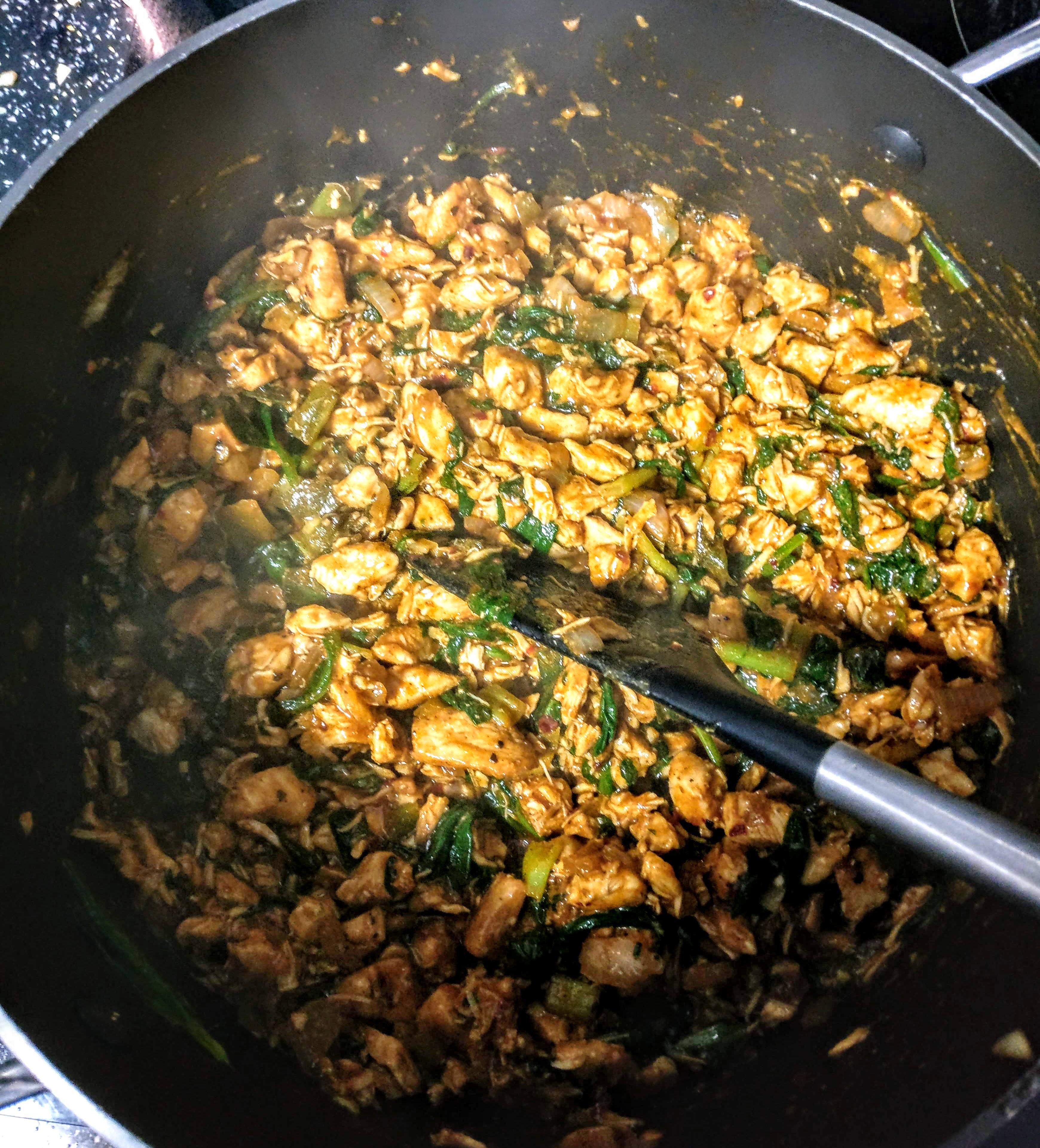 Chicken, Spinach, Spring Onions, Chillis and Spices. Simple with rice