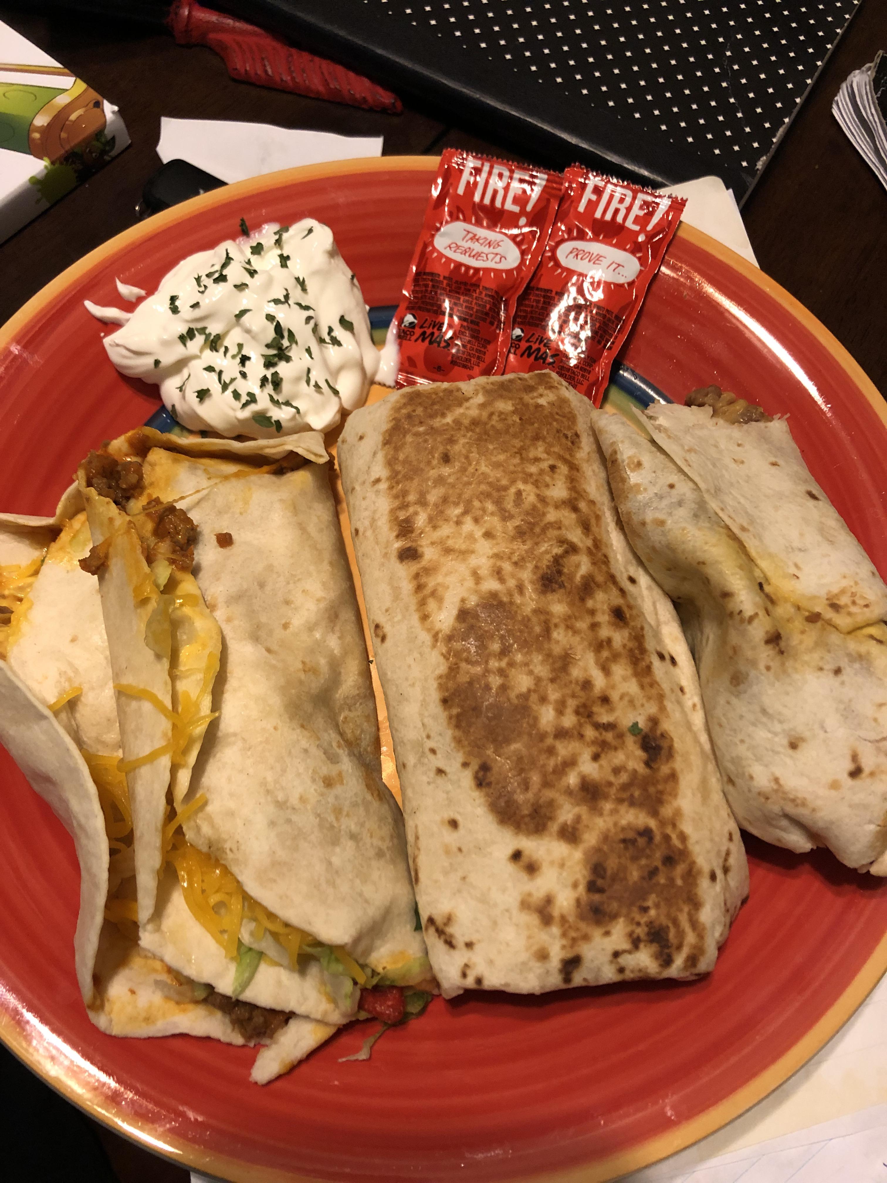 Two nacho tacos! Steak Quesarito! One rice and bean burrito! Ex. Sour