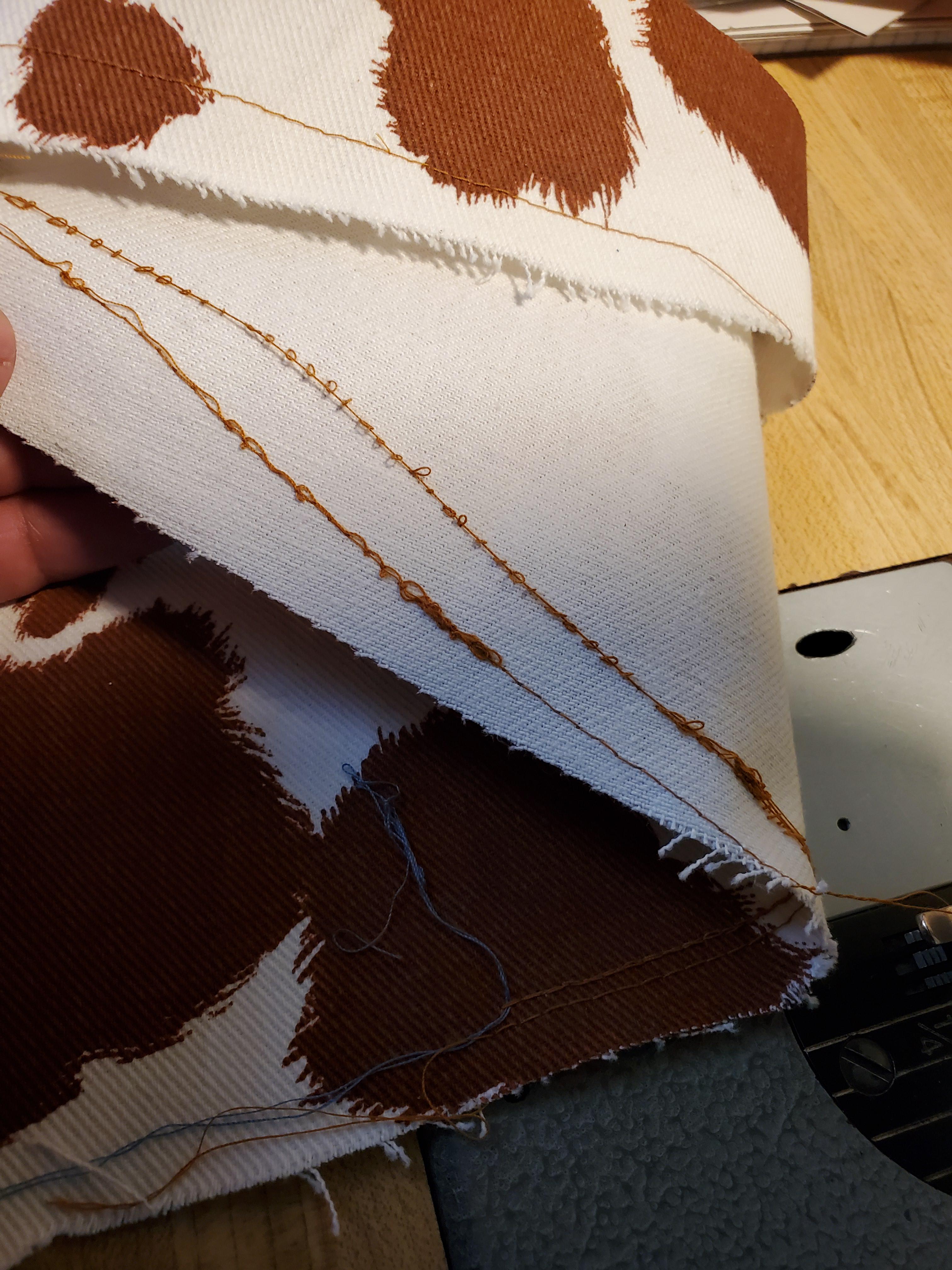 My mom has a Juki sewing machine and while the top looks good, the stitching on the bottom looks