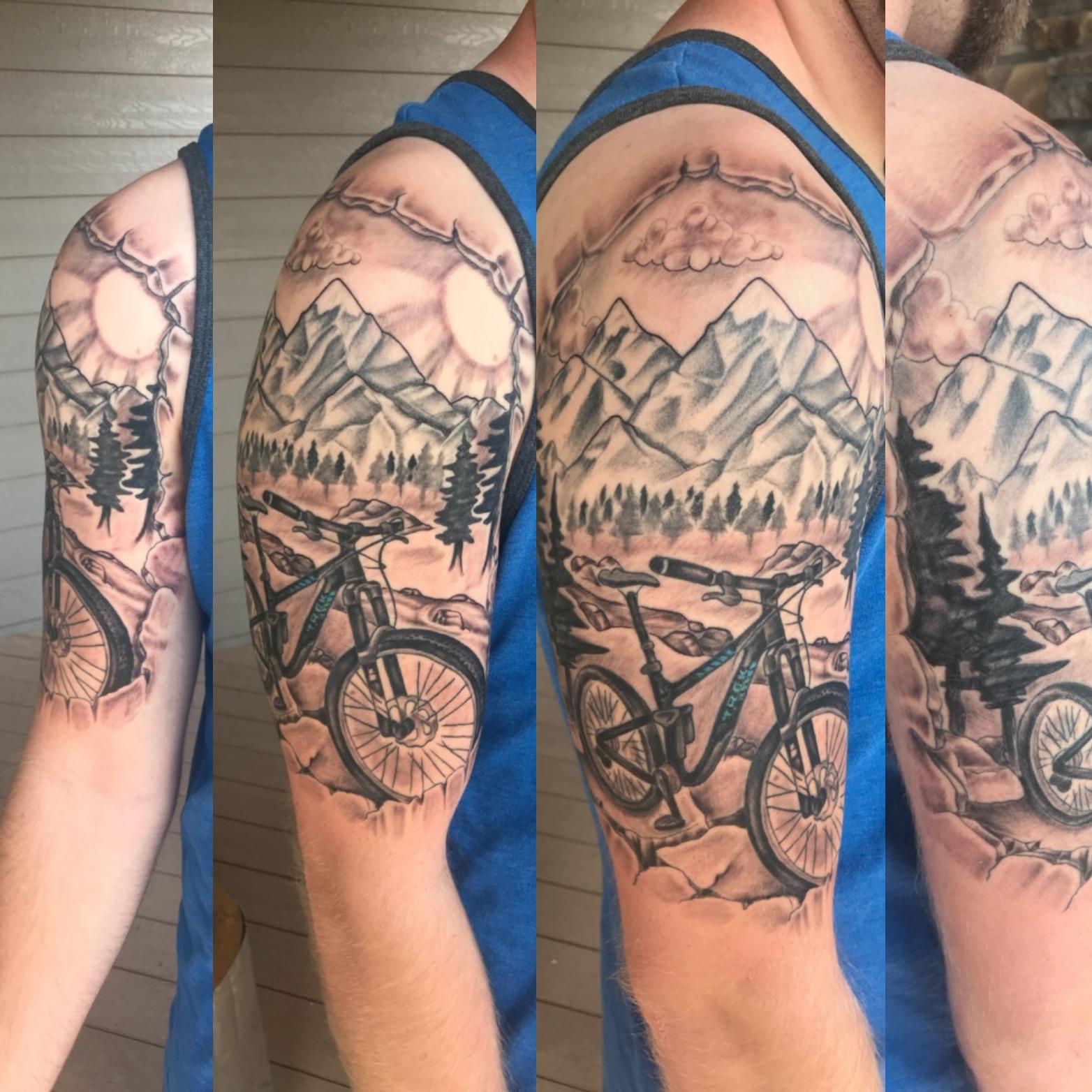 Recently finished my mountain bike tattoo. Done by Clint Big Brain