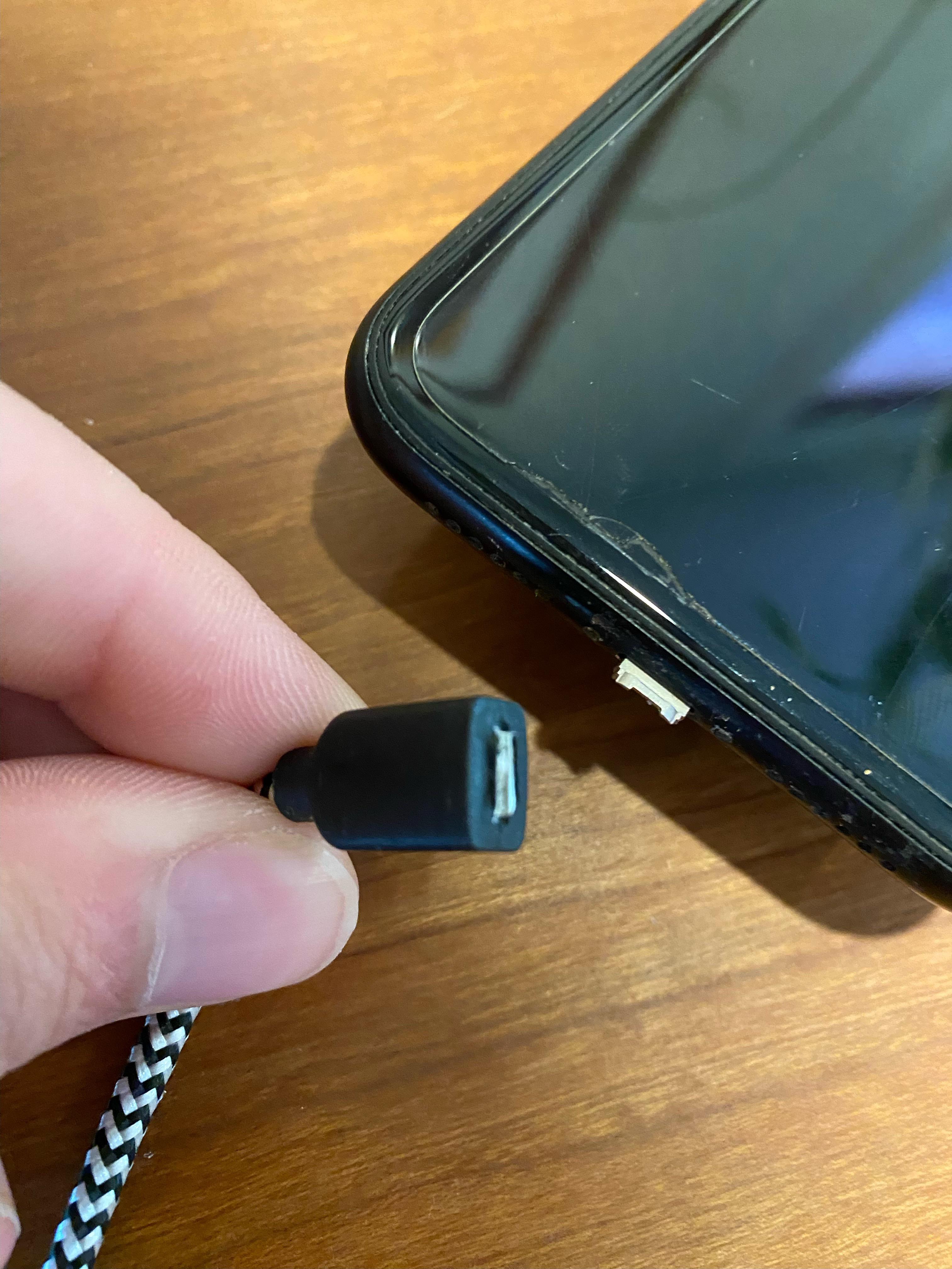 Unplugged my new iPhone charger and the tip broke off inside my port