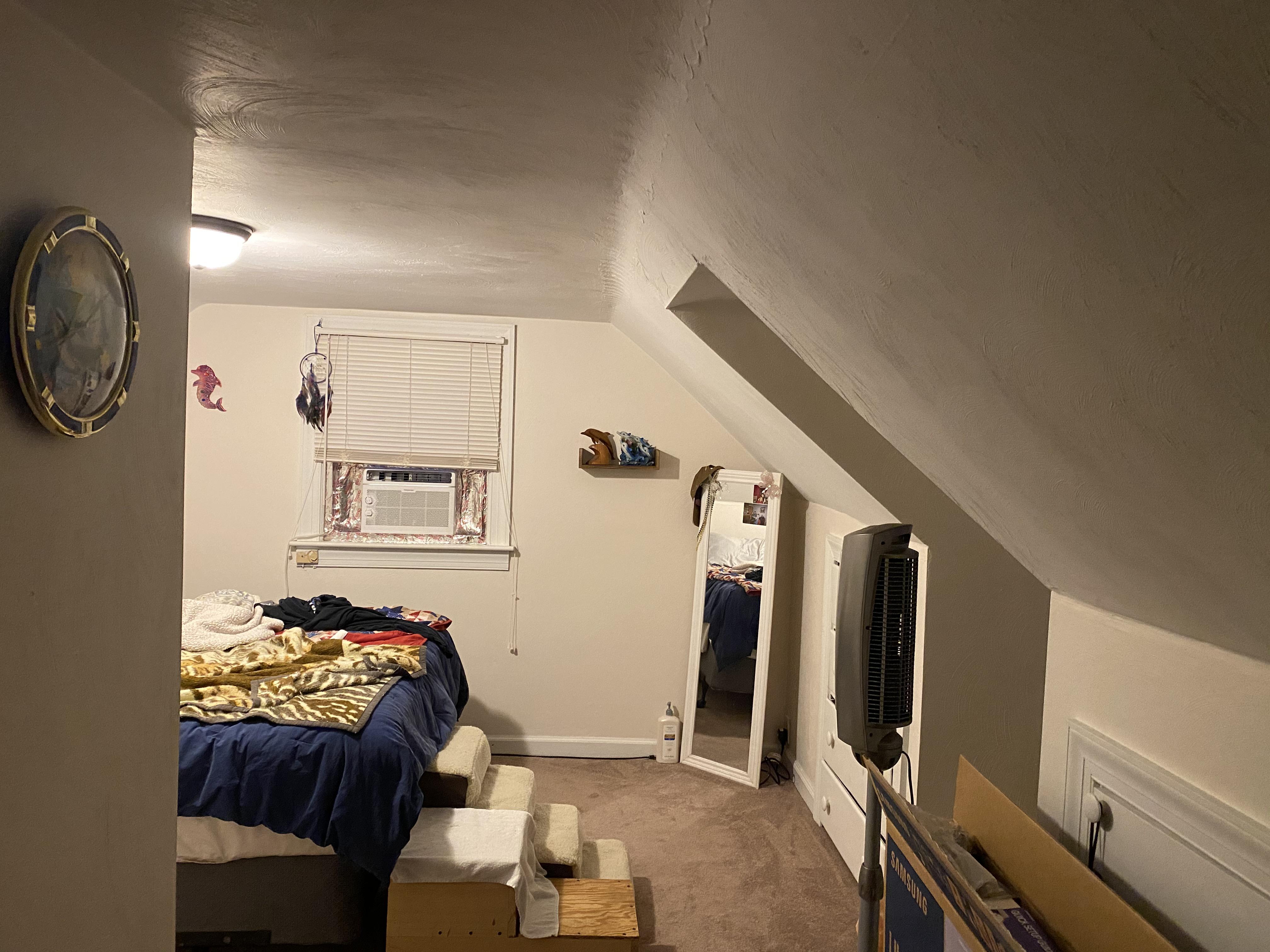 What is the best way to mount a TV on the slanted ceiling/wall? r