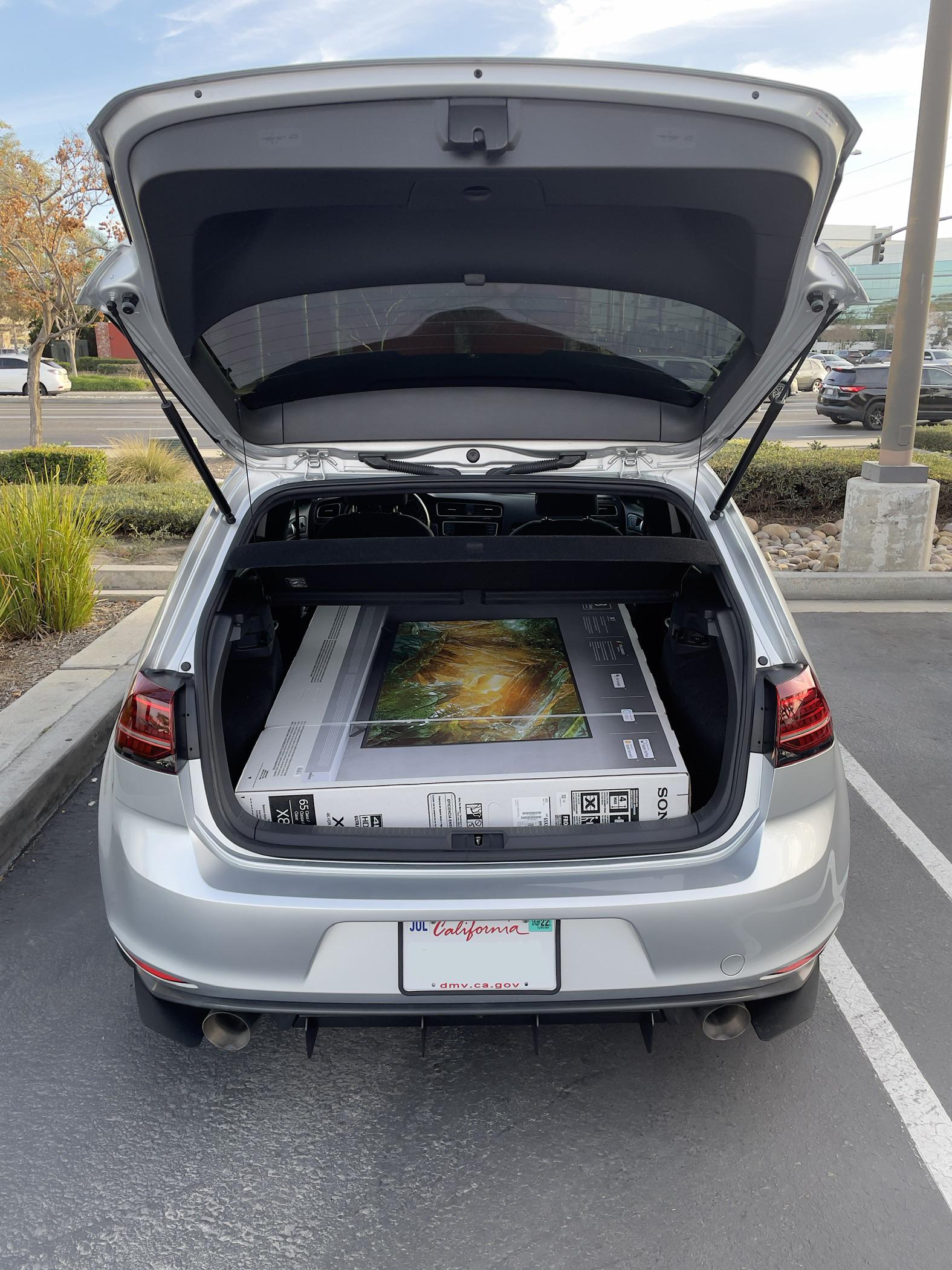 65” TV in a MK7? Why yes. r/GolfGTI