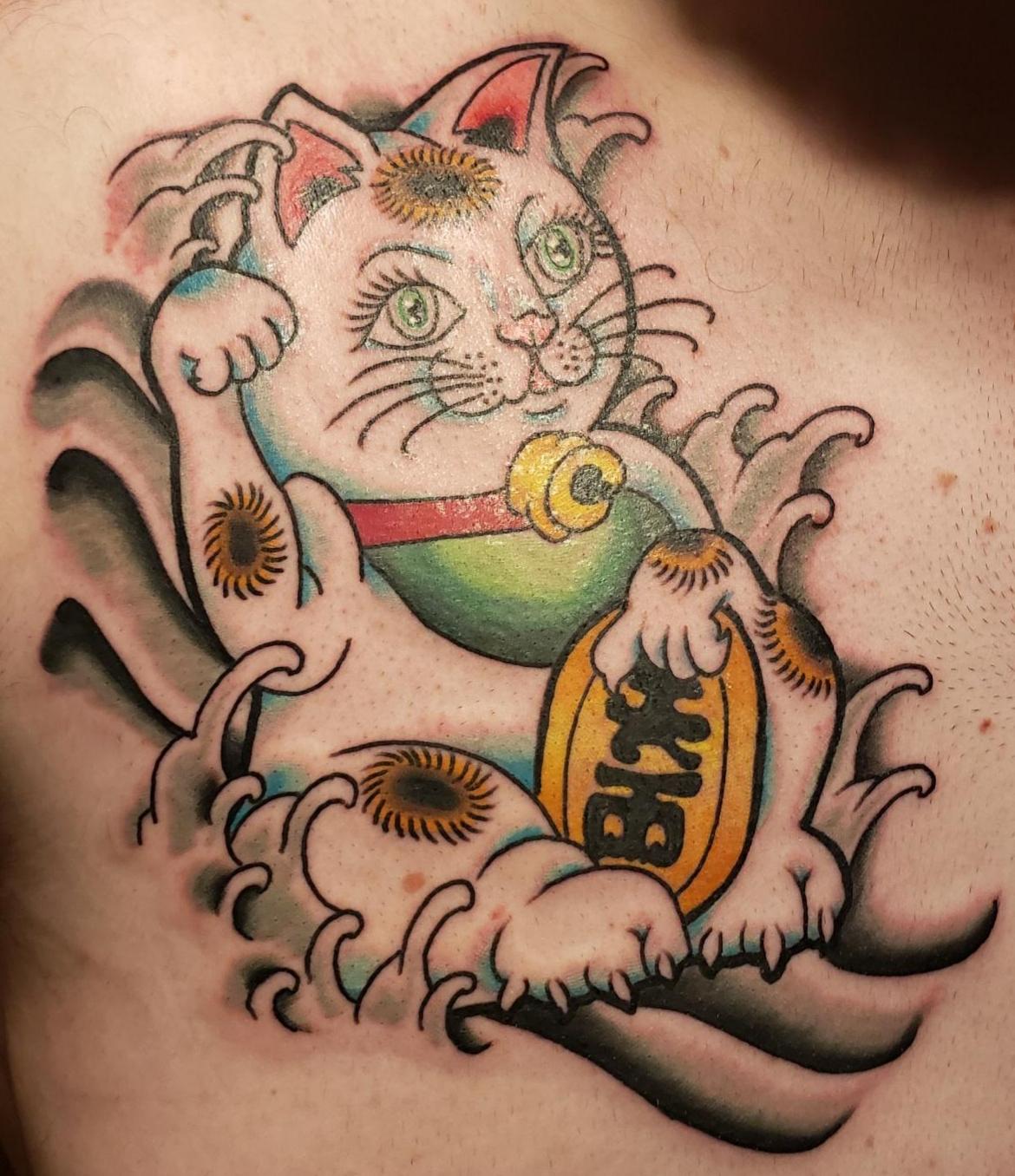 Lucky cat baby Ryan at Big O Tattoo Lincoln Ne tattoos