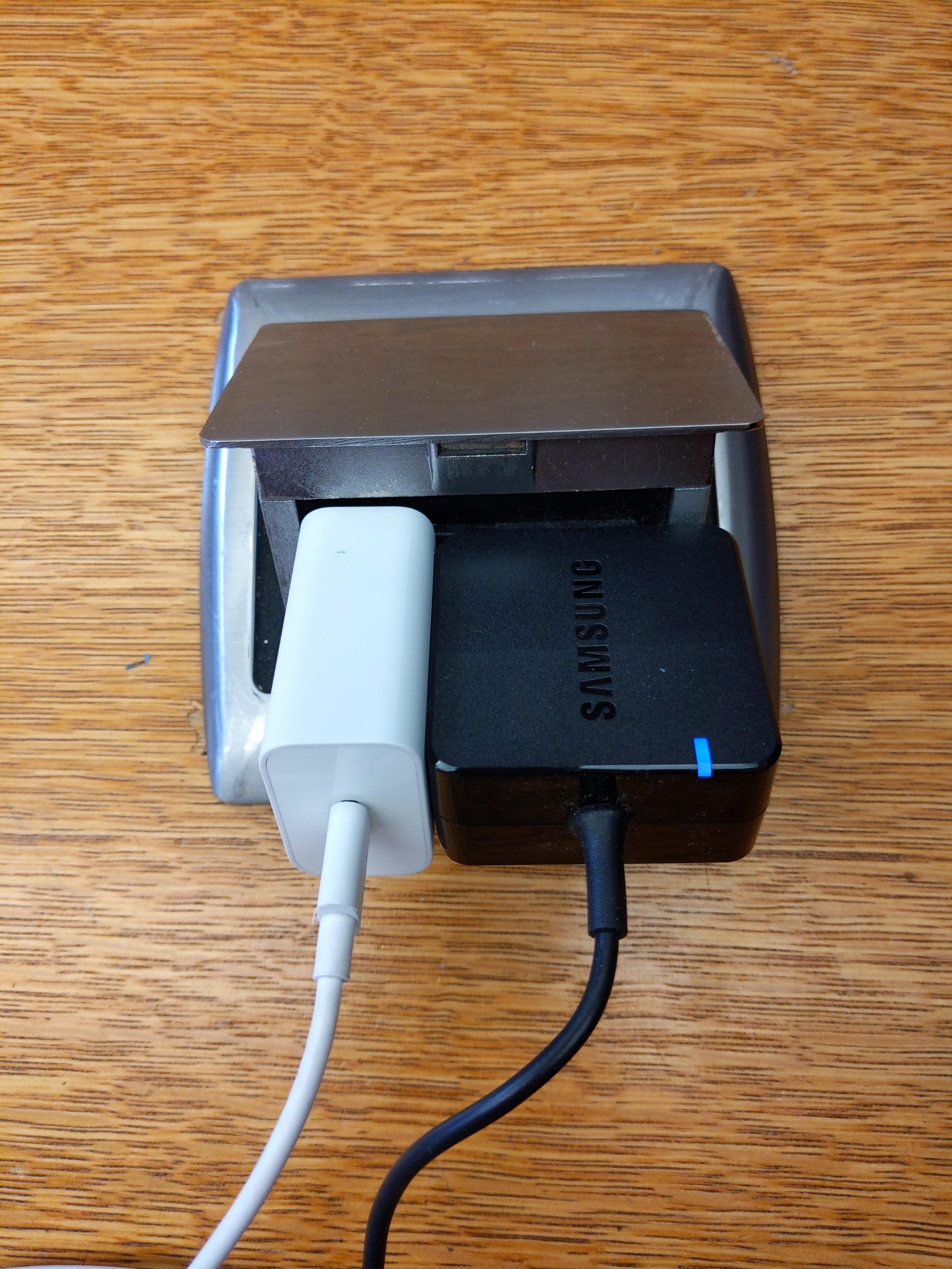 My phone and laptop chargers fit perfectly in this desktop outlet r