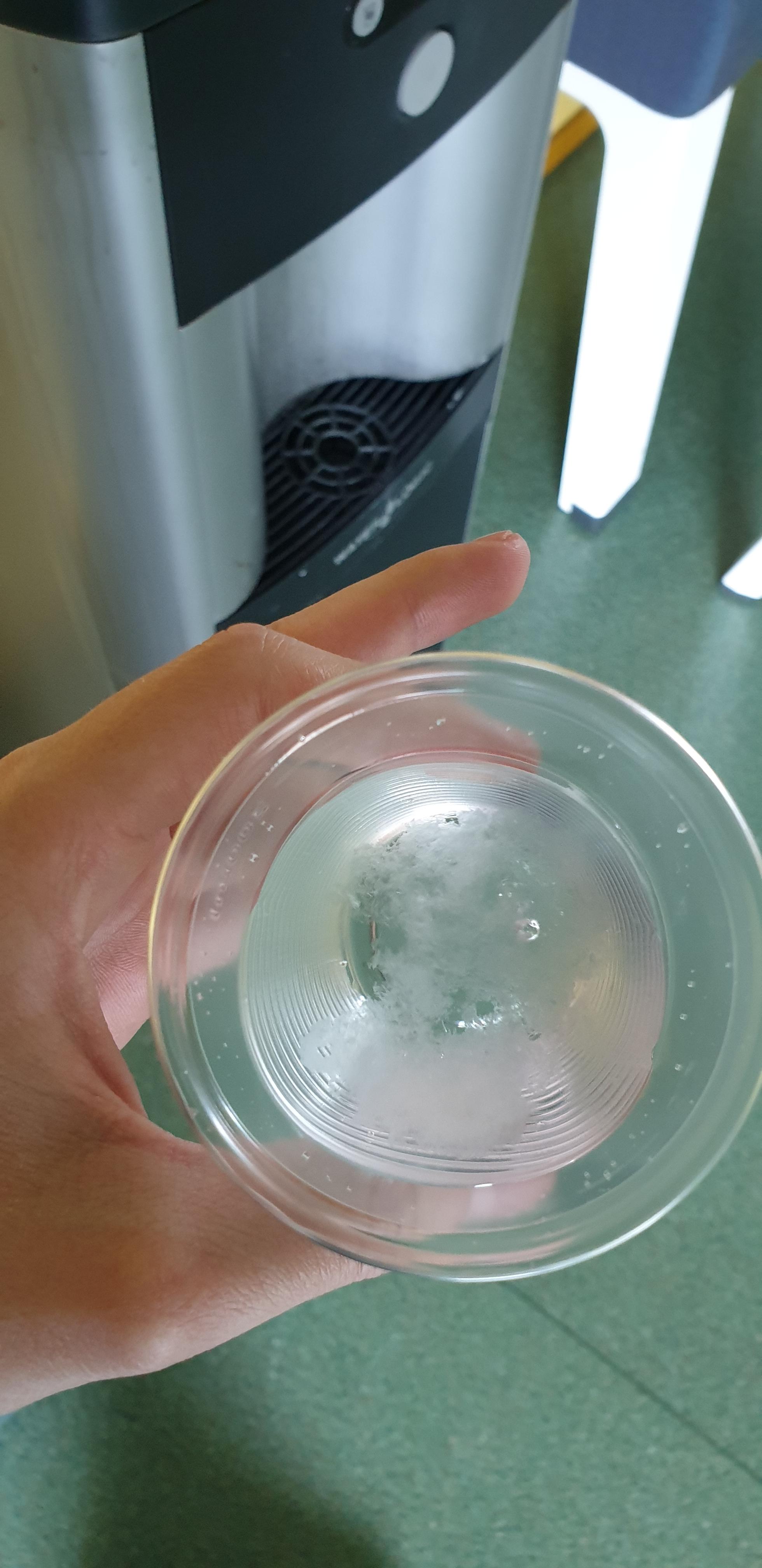 My school's water dispenser gives water so cold, some of it froze into