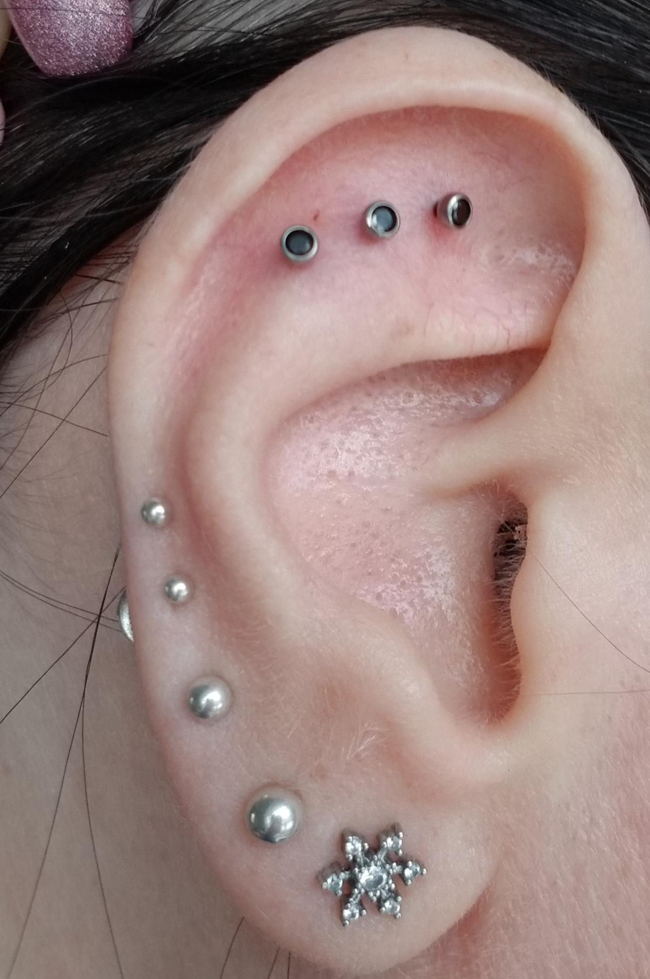 Triple Flat piercing done yesterday at Blackmoon Piercing NJ by Brie. 🖤