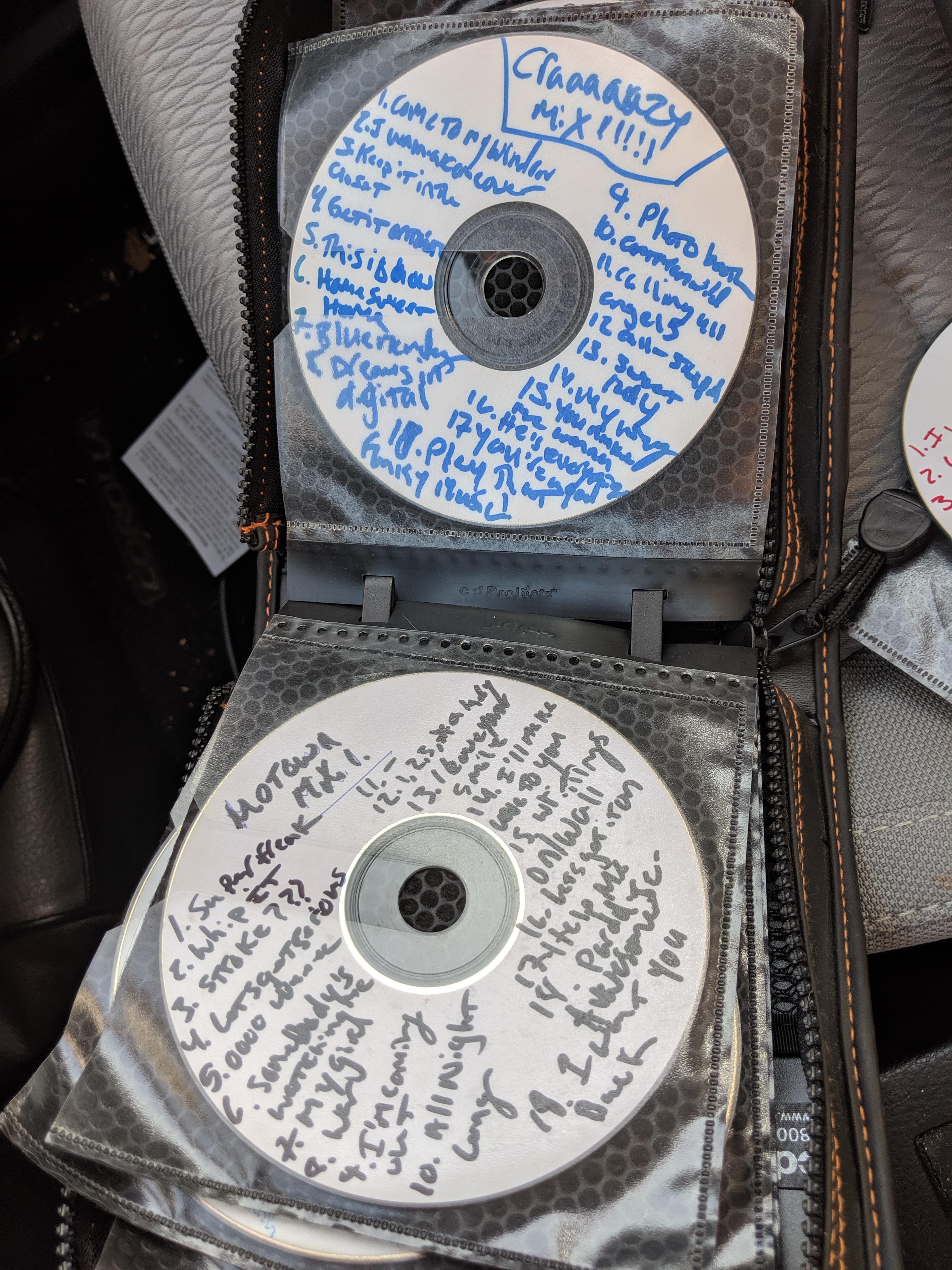 Found a CD holder with my old burned CDs, going through some boxes. r/nostalgia