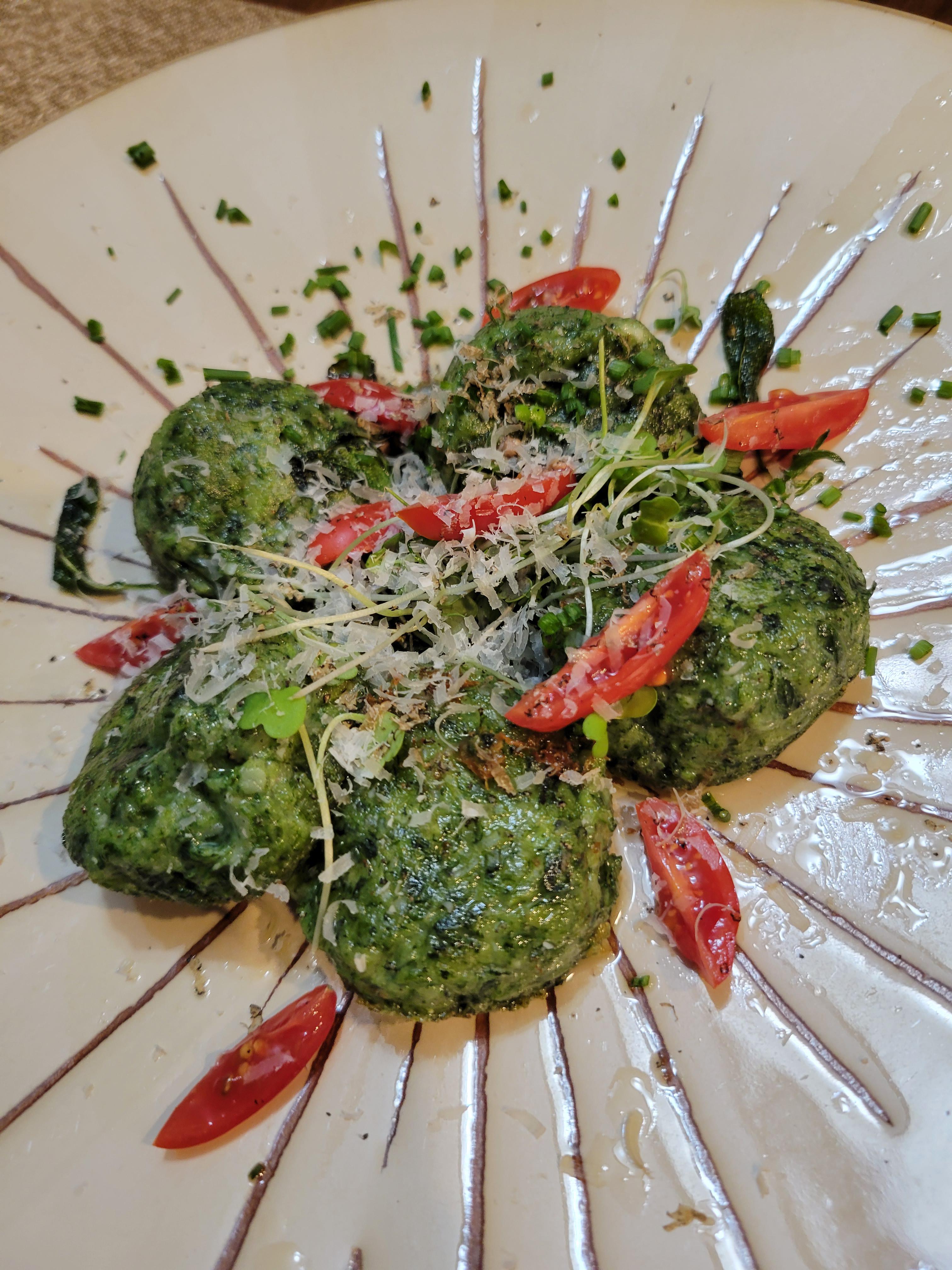 GF spinach and ricotta gnudi with sage brown butter sauce, black