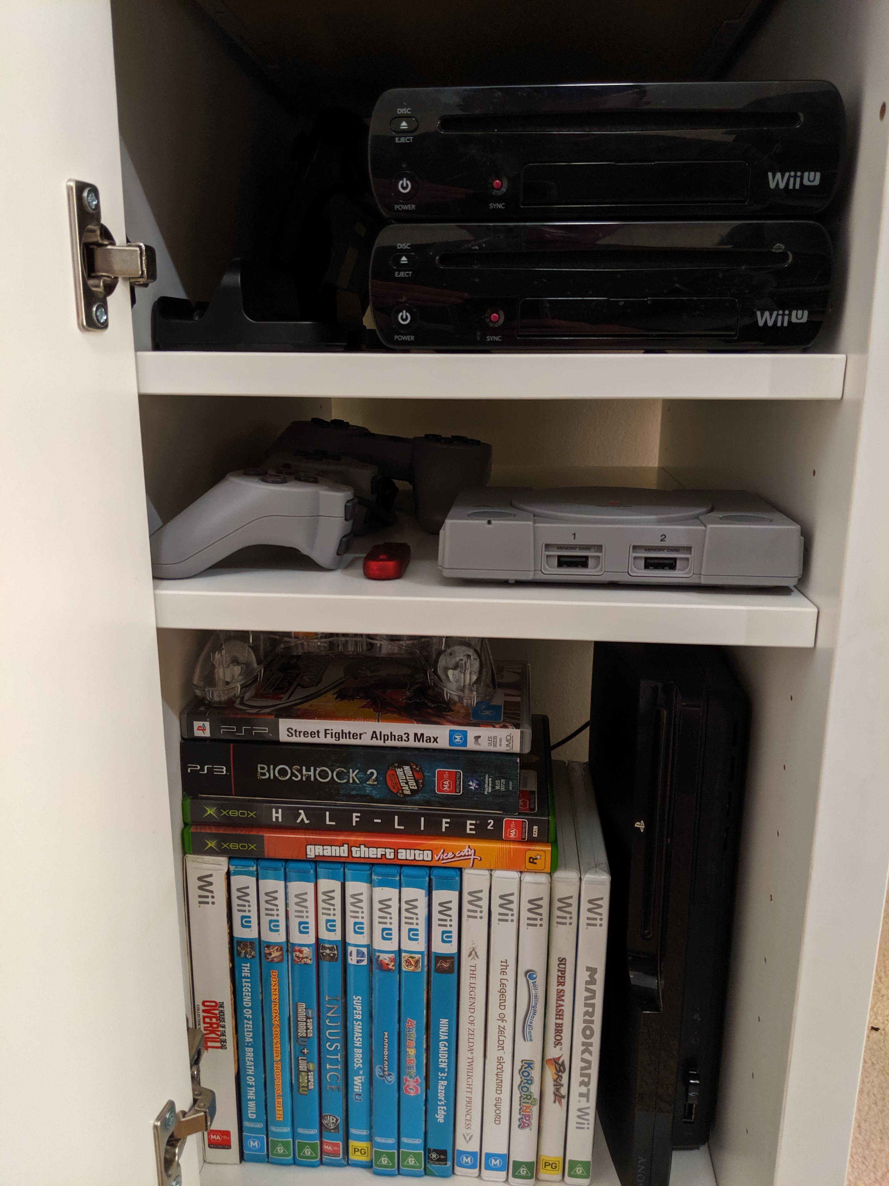 The cupboard in my PC desk has all my modded consoles...it's not much