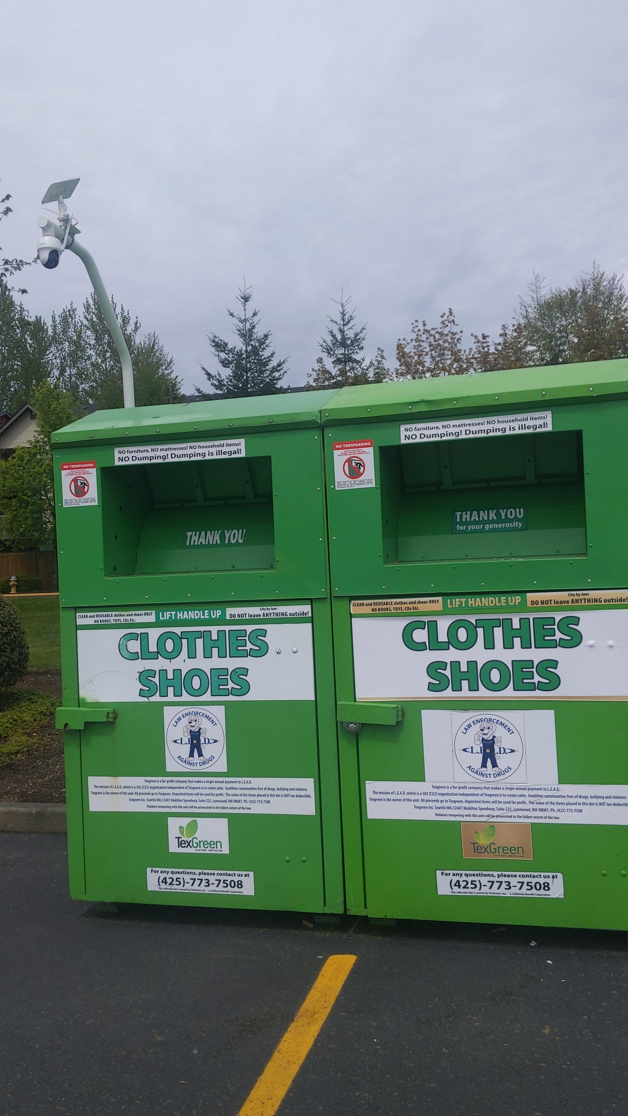 Clothes donation bin with a security camera. r/mildlyinteresting