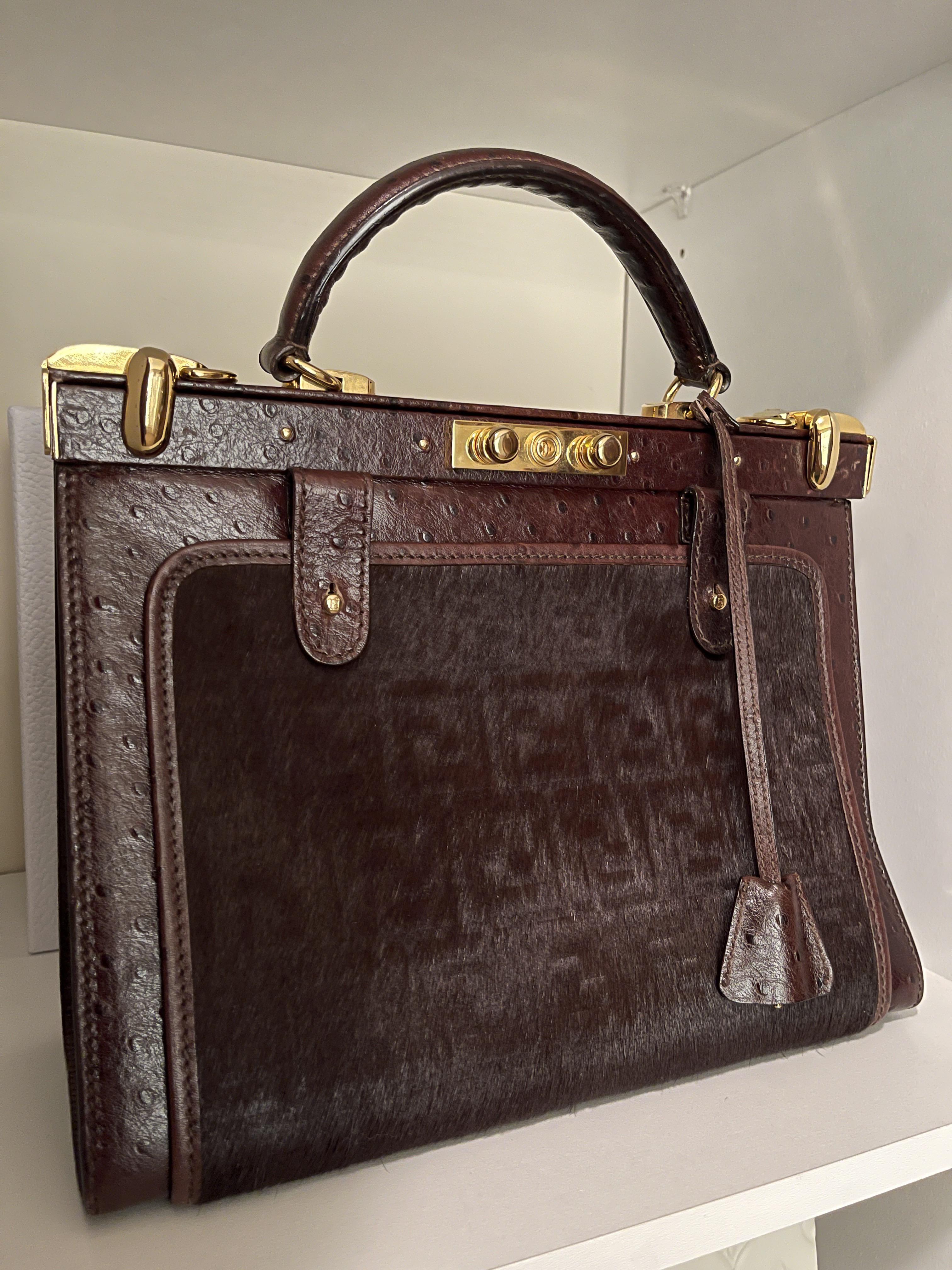 Does anyone know the history/name of this Vintage Fendi Handbag?? r