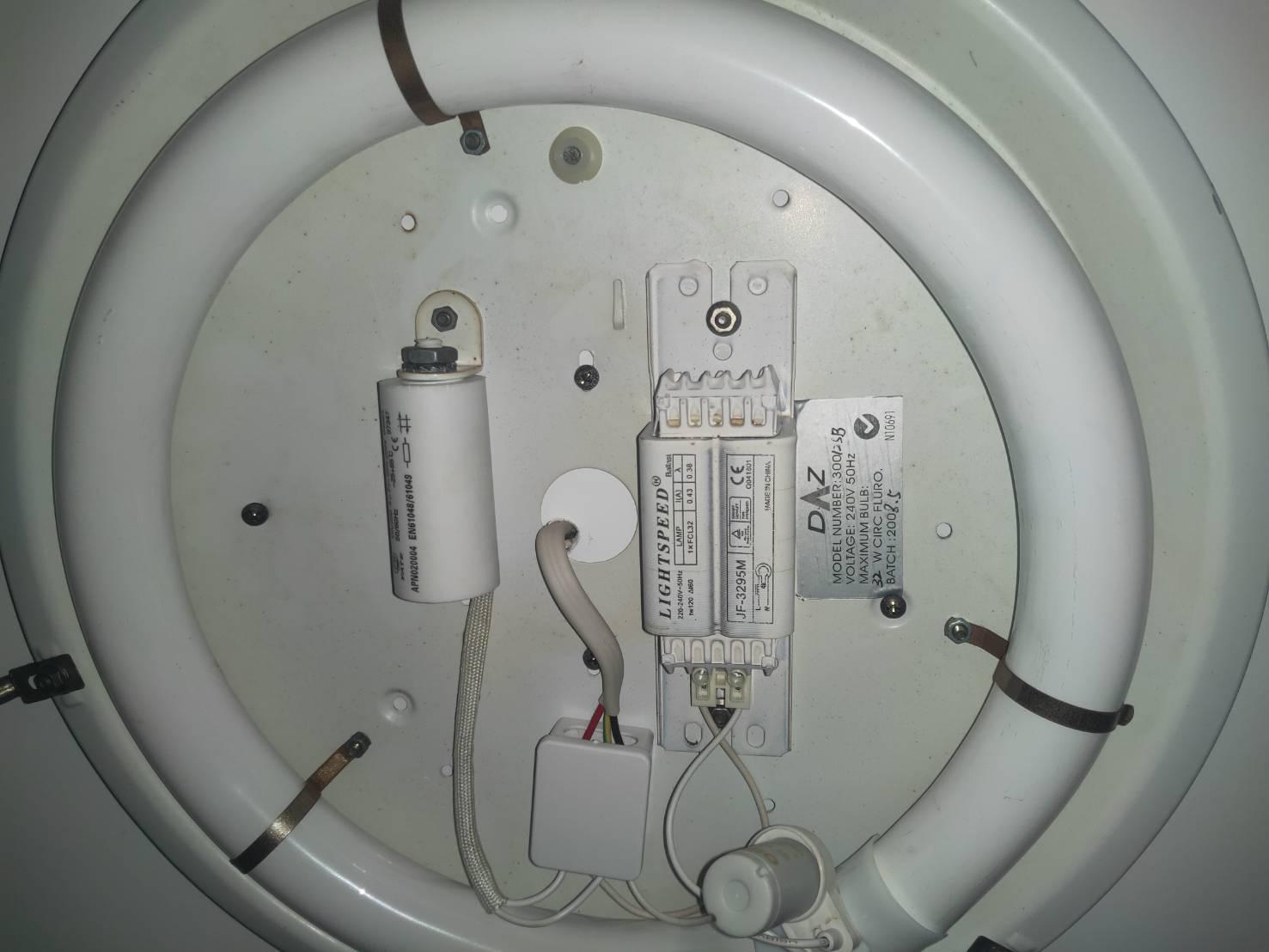 Why isn't my bathroom light turning on properly? It's very dim and