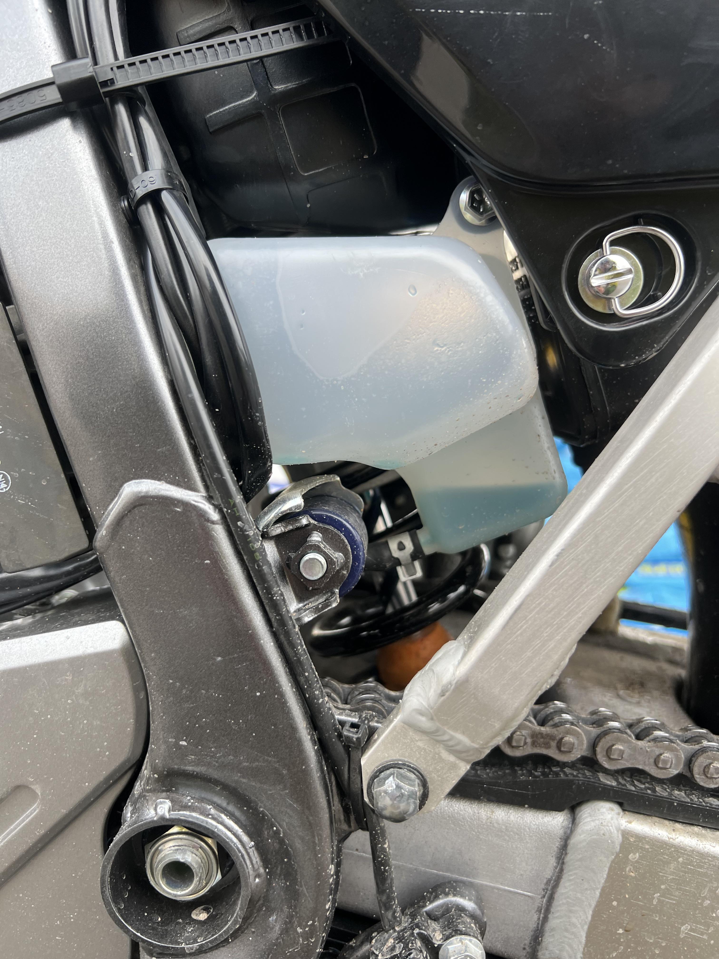 Frozen liquid, is that bad? Is this the coolant overflow? : DRZ400