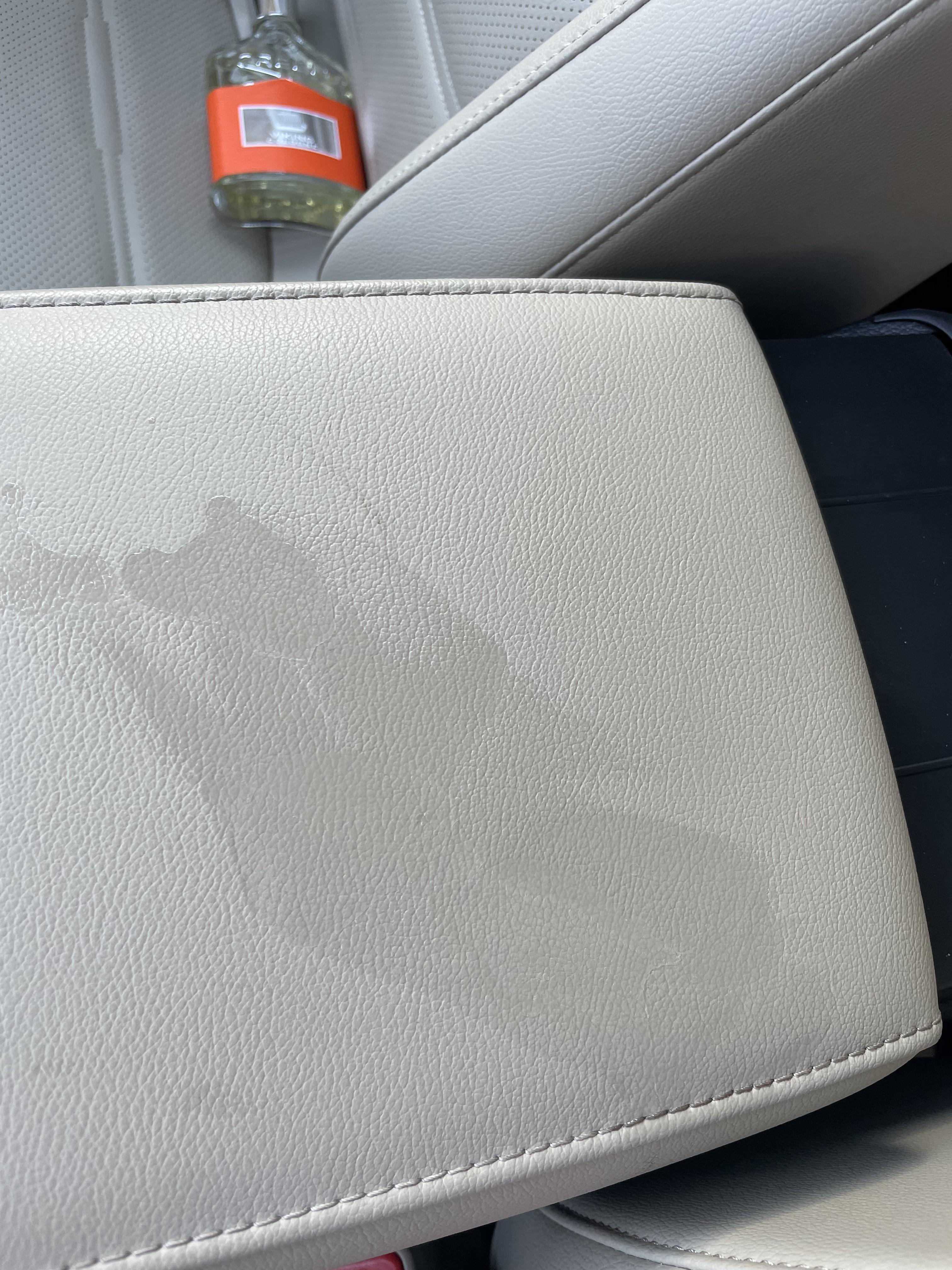 How to clean this superglue stain from leather in car r/howto
