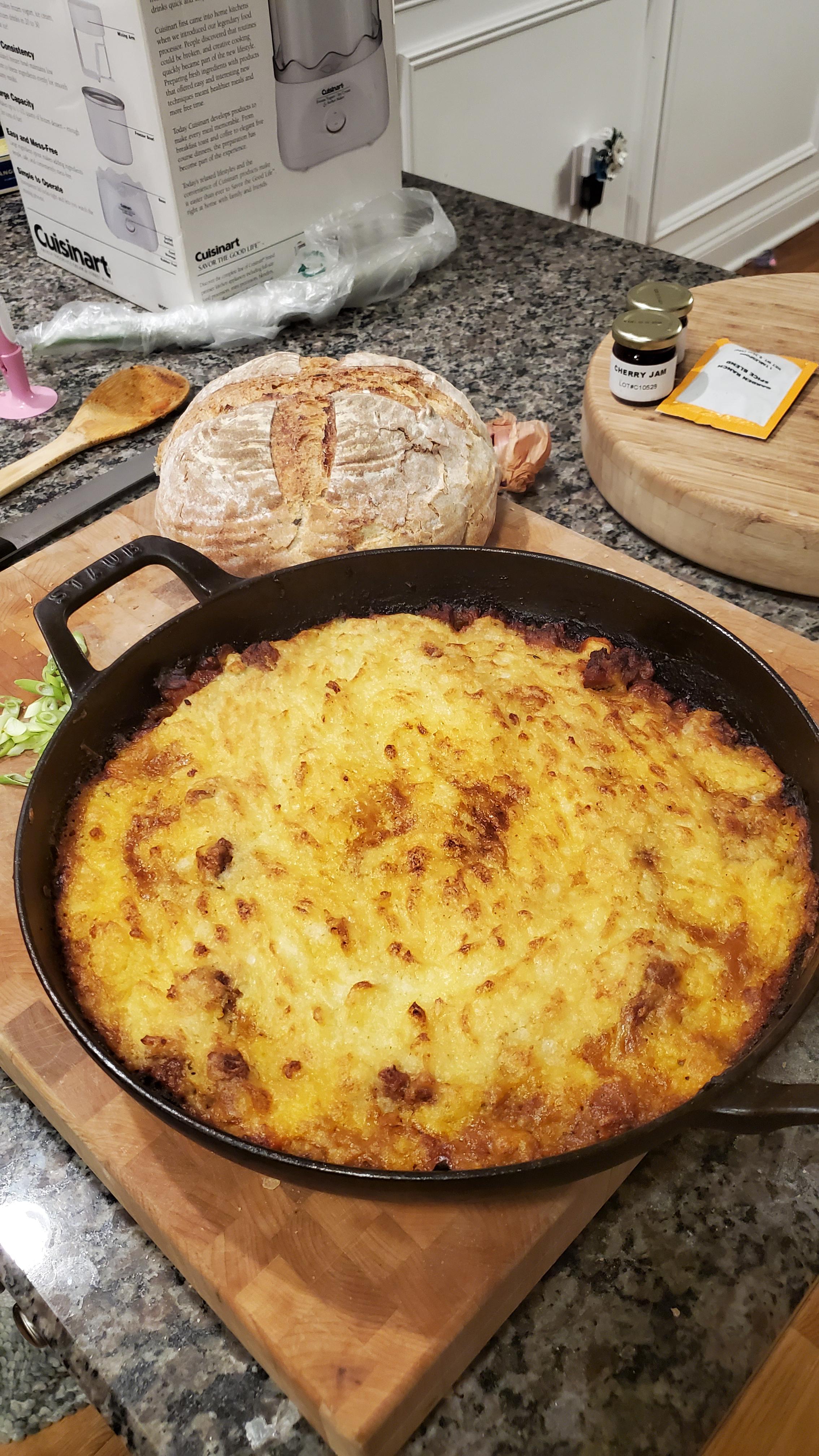 Shepherd's pie with a dutch oven rosemary and roasted garlic bread. r
