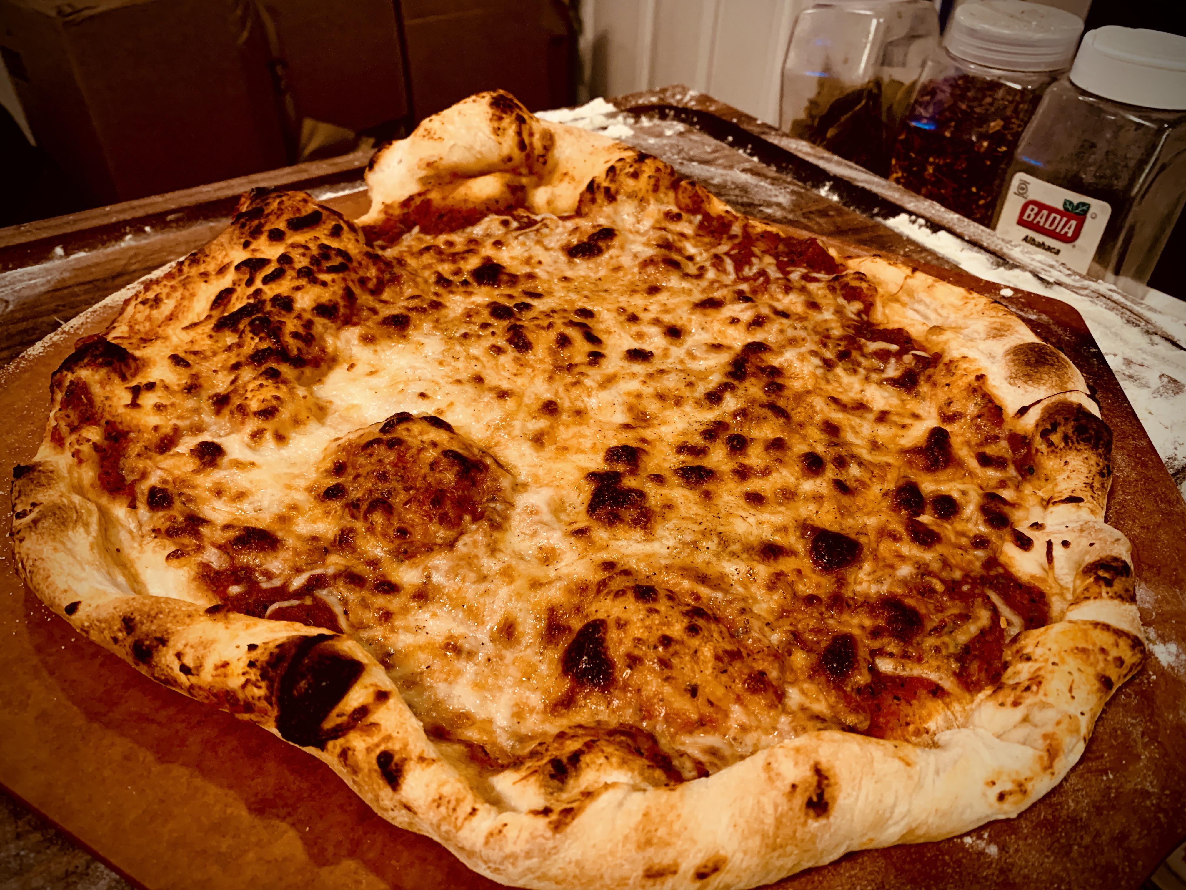 Made some pizza in the oven. Used pizza shop bought dough. r/Pizza