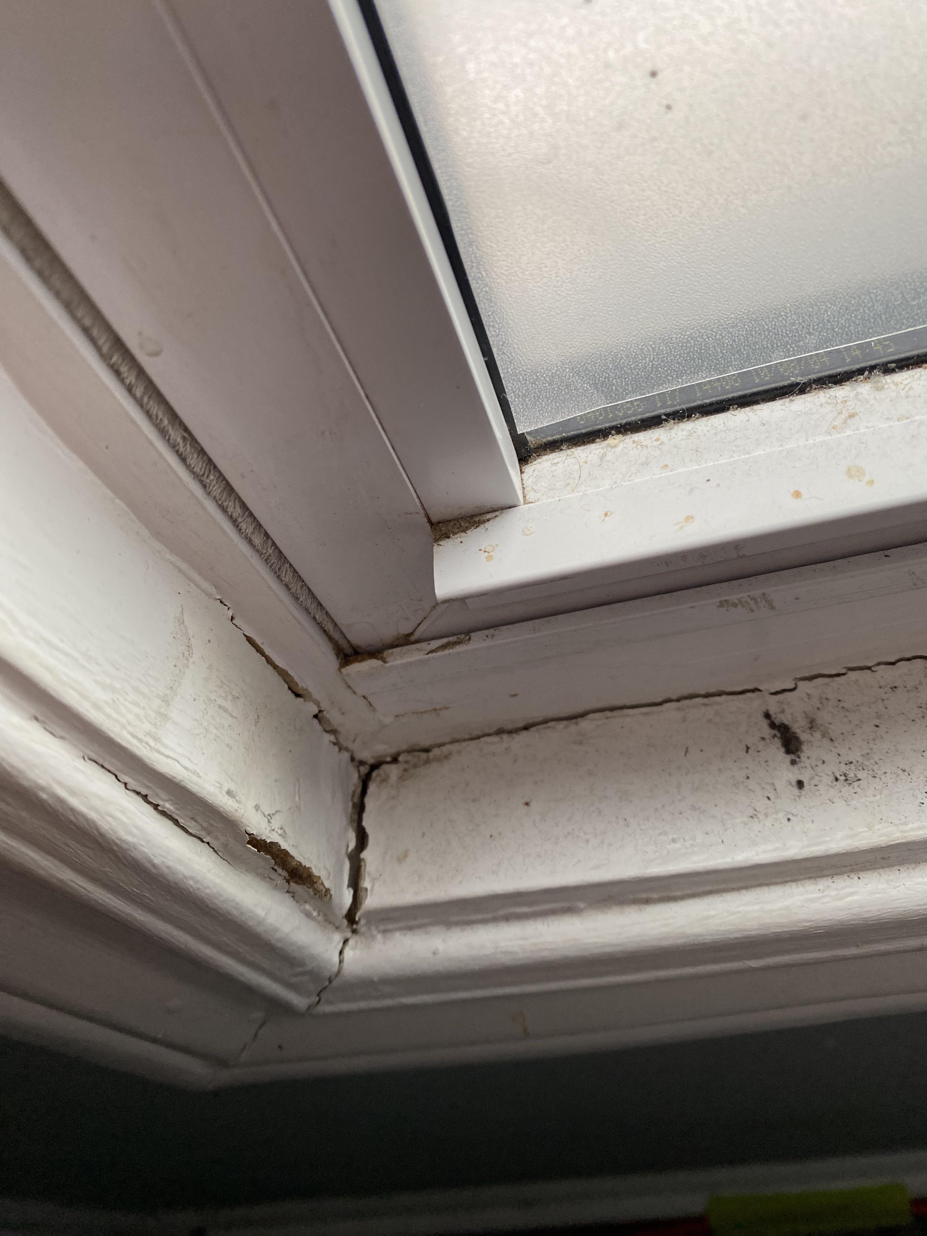 Frame around window has cracks How does one fix this relatively cheap