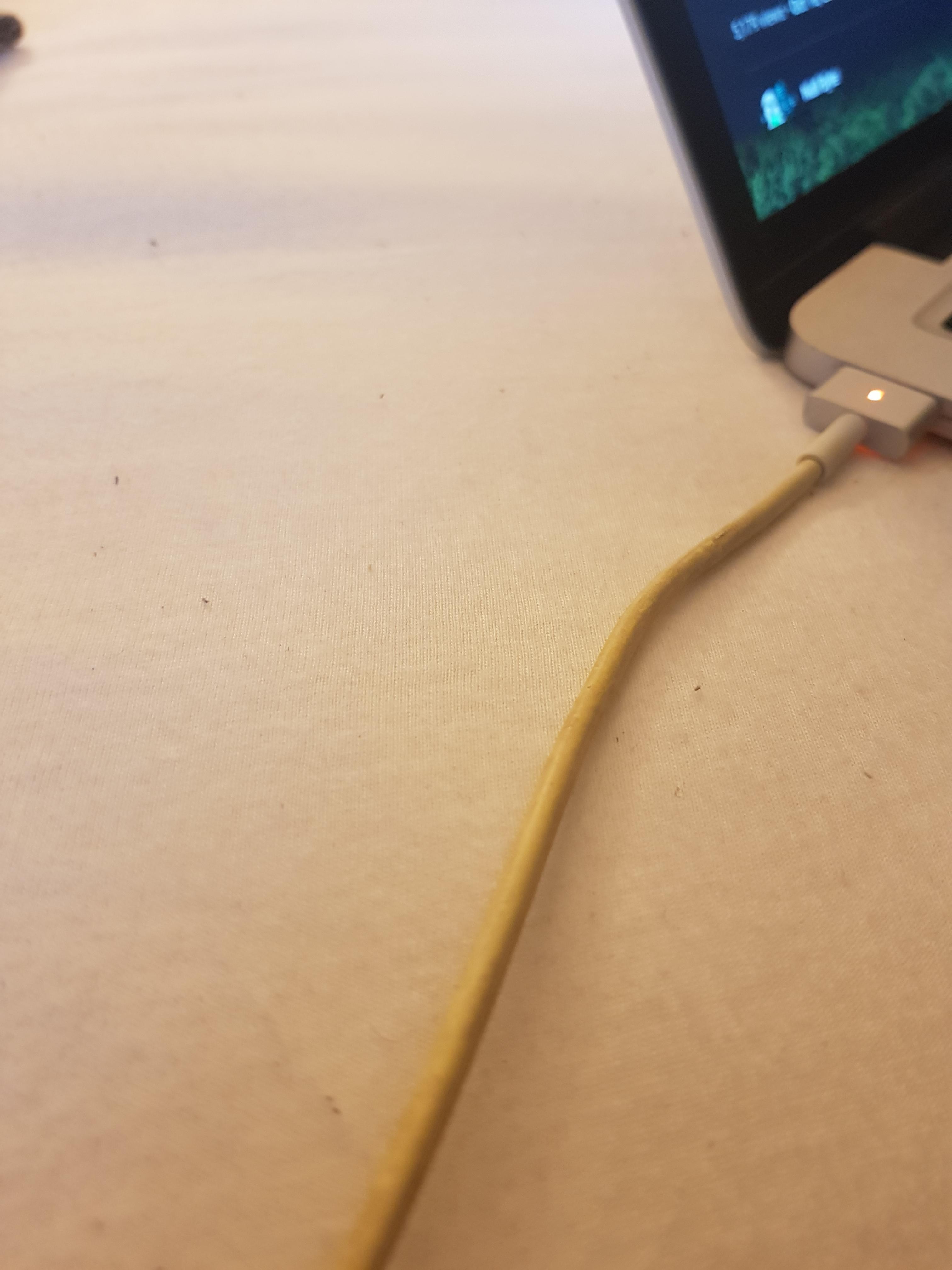 Charging cable turning yellow. Is it dangerous? r/macbookpro