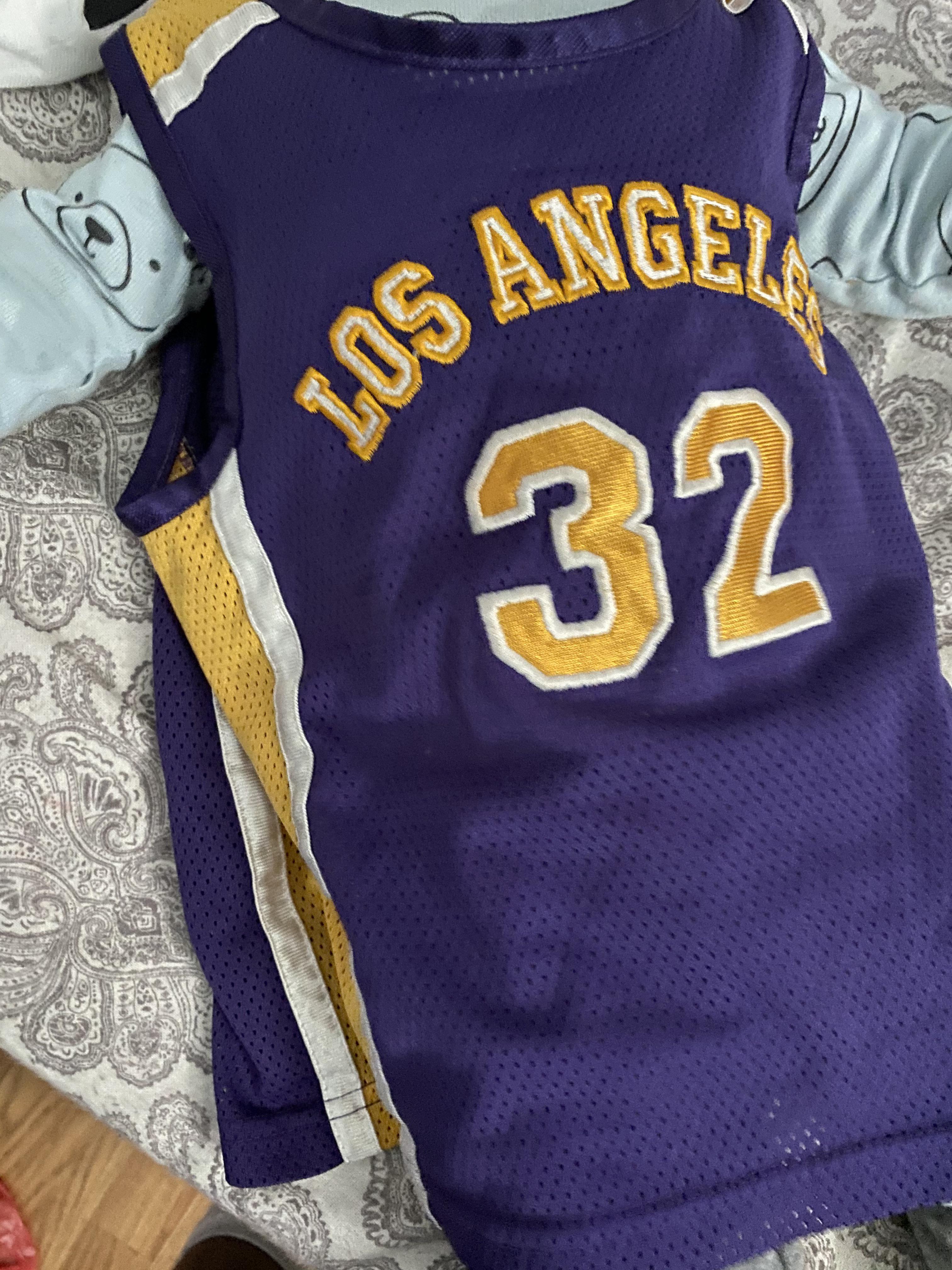 This was my very first Laker jersey/outfit as a baby, thanks to my