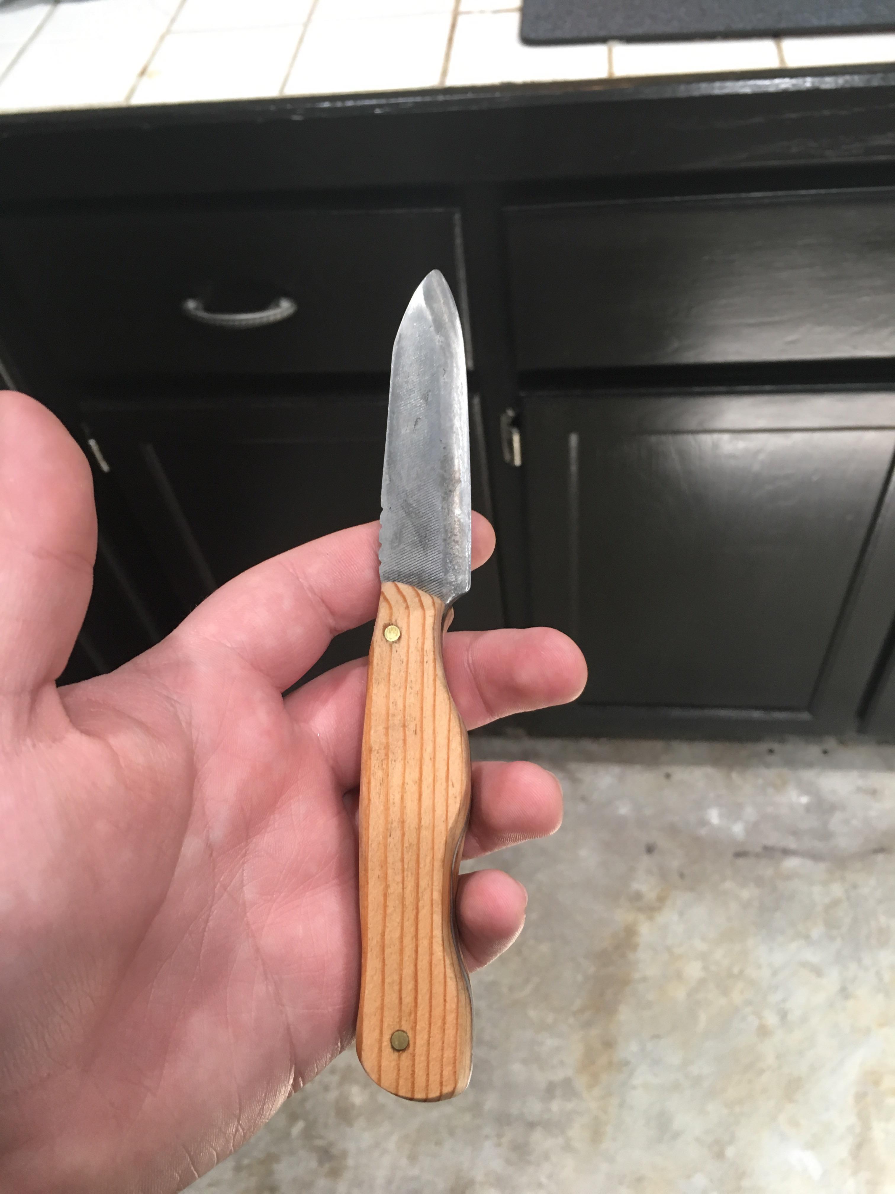 First Knife!! Made out of an old file and a red oak 2x4. Had tons of