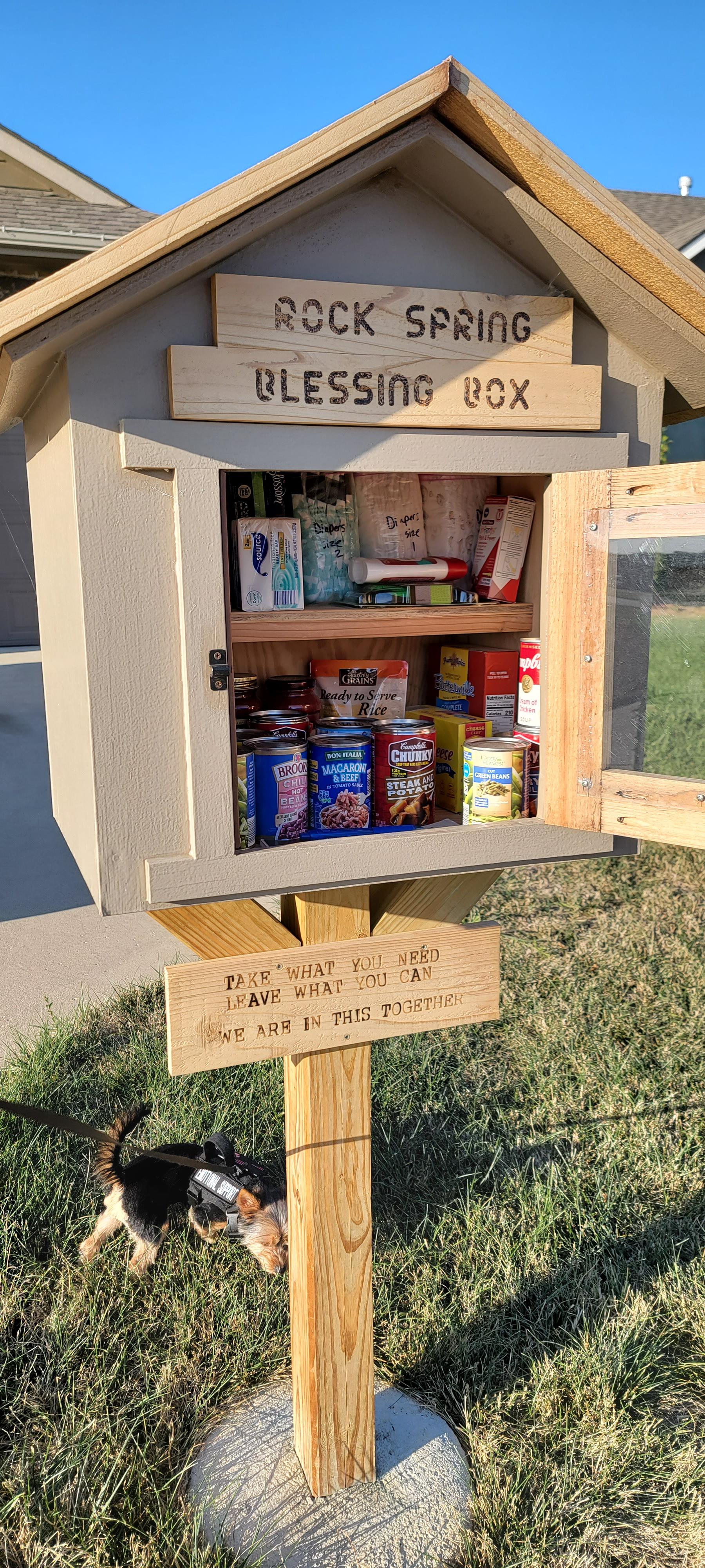 A blessing box that someone made in a neighborhood near us. "Take what