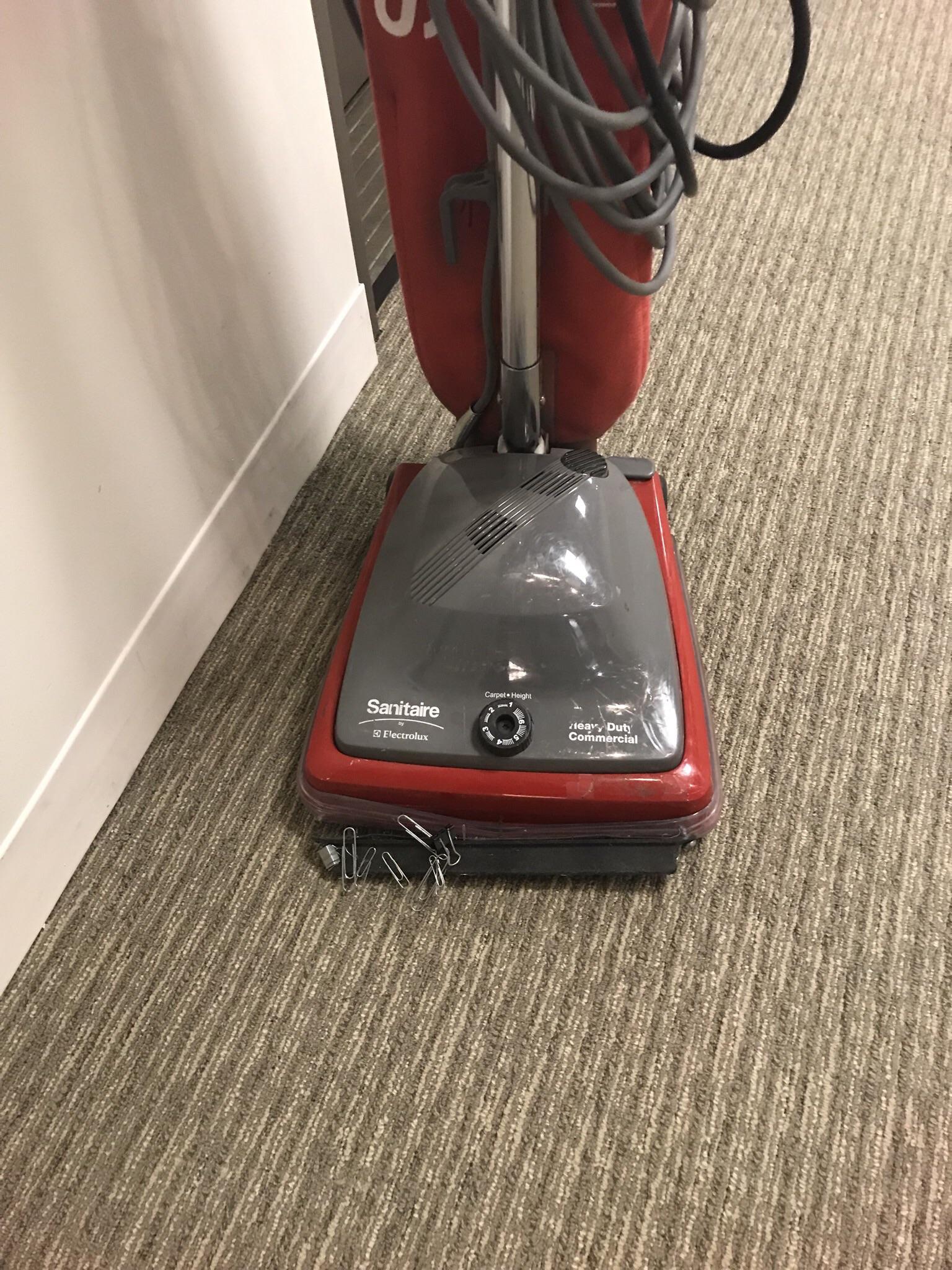 The cleaning crews use a strip on the front of the vacuums in