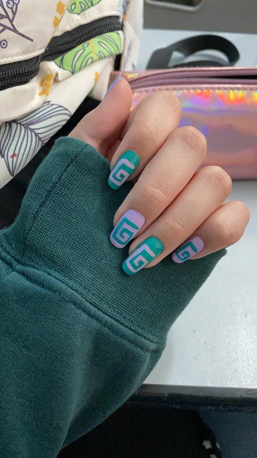 Since everyone are posting their Karl nails.. I really like how they