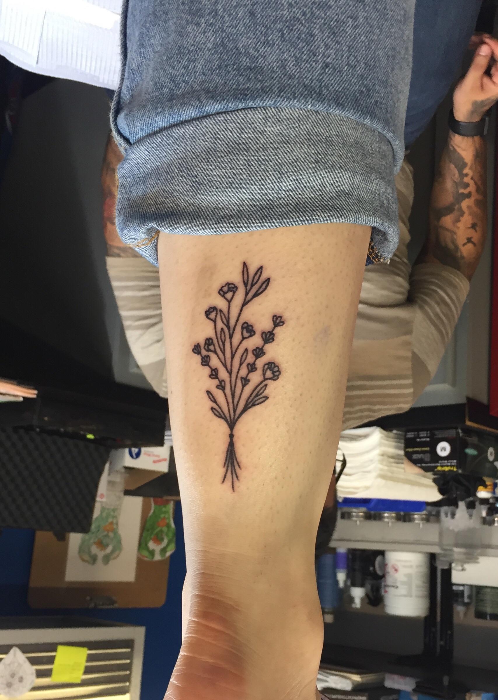 My wild flower tattoo by Lo at Blue Rose Tattoo Studio in Fort Worth
