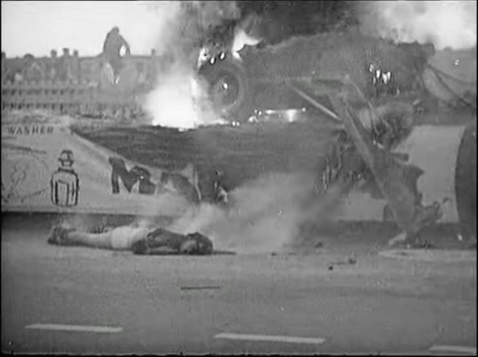 A race spectator lies dead on the track after a car collides with the