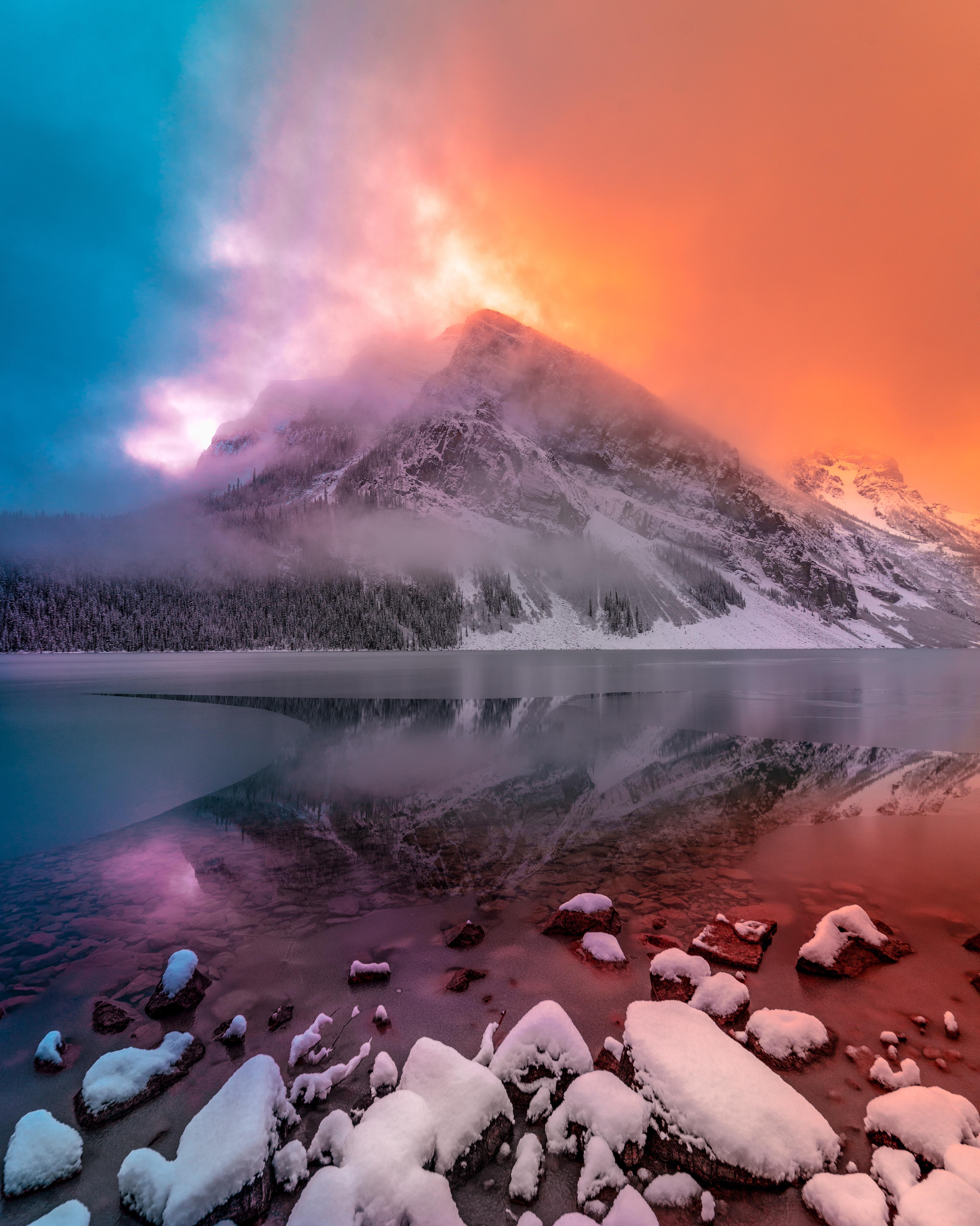 Fire and Ice. Lake Louise, AB, Canada [OC] [4000x5000] r/natureporn