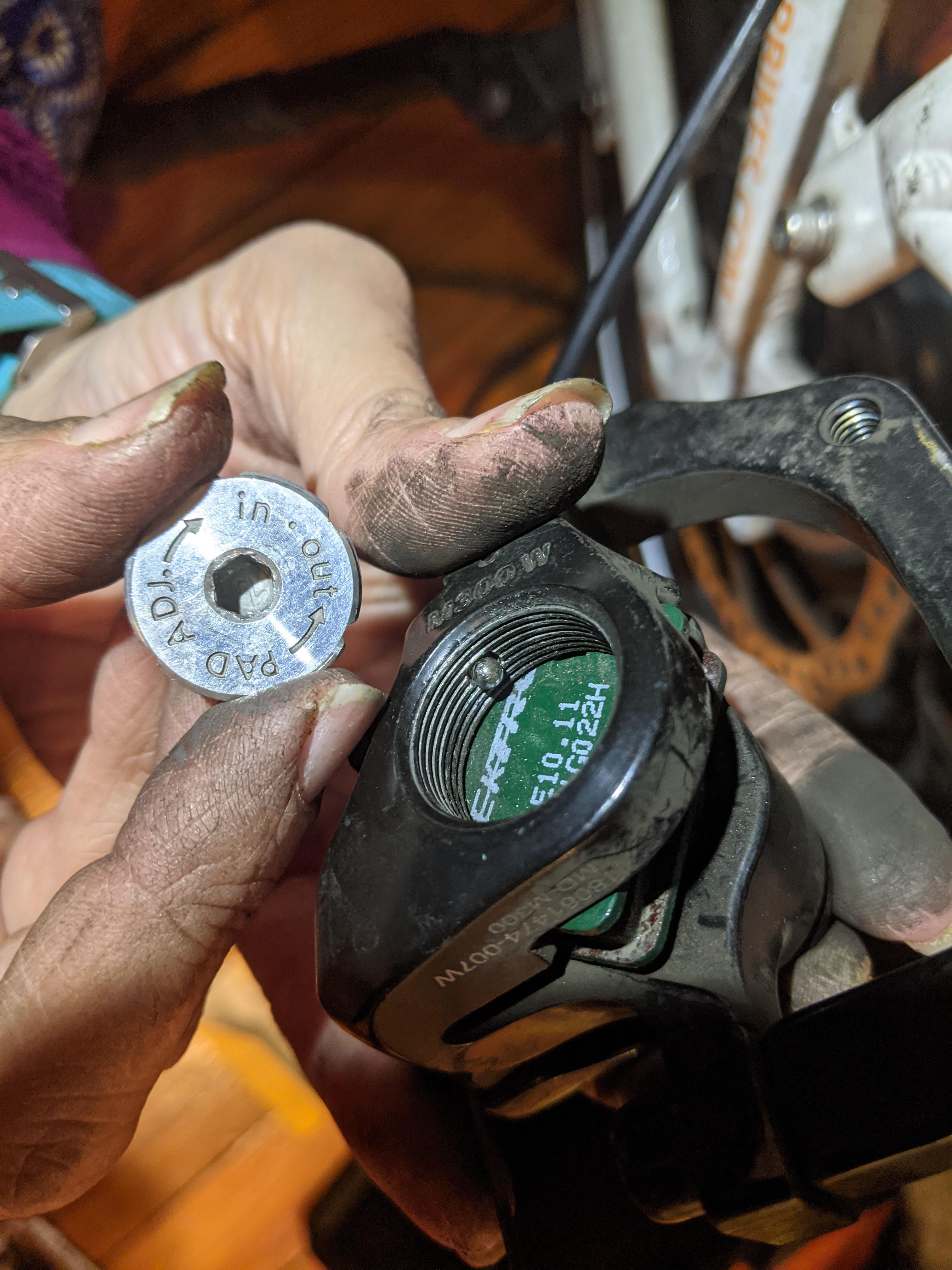 Pad adjust screw fell out, and can't go back in (with ball bearing) r