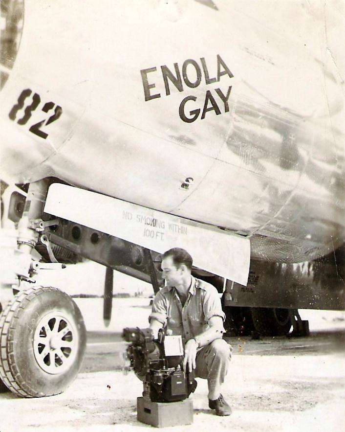 Enola Gay bombardier Thomas Ferebee with the Norden Bombsight on Tinian