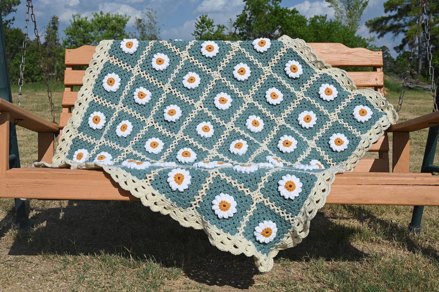 I made a crochet daisy granny square blanket. I did not use a pattern