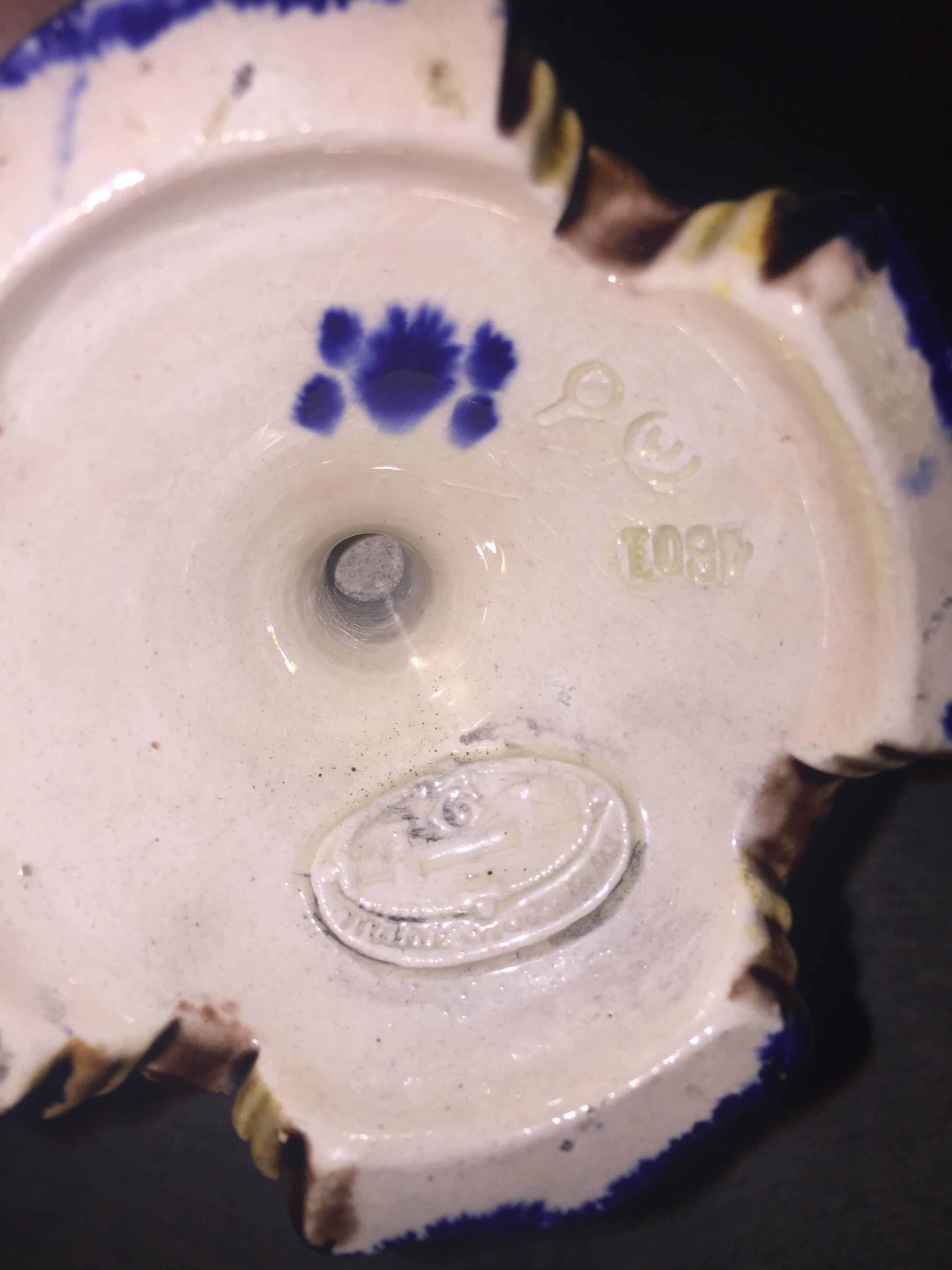 Can anyone identify the maker of this vase? We have narrowed the date