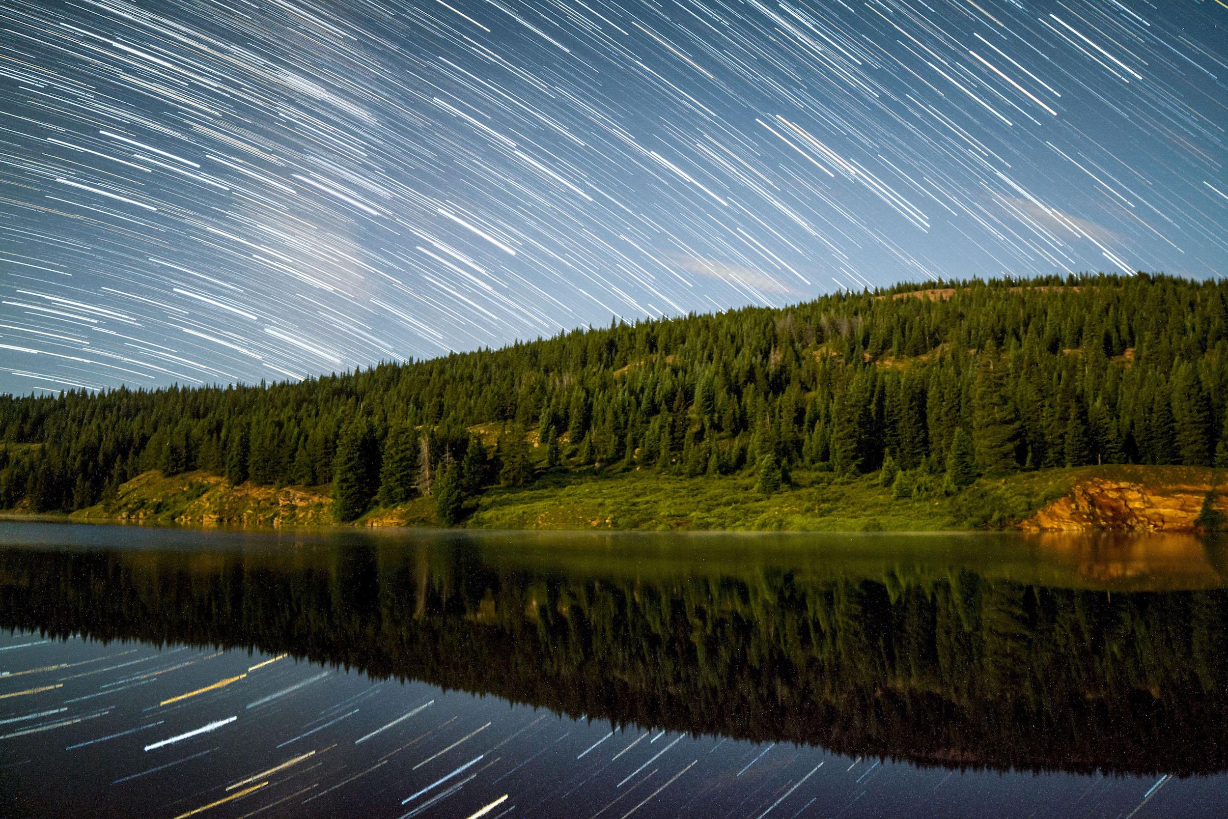 Moonlit star trail reflections at the Black Lakes in Vail, CO [OC] r