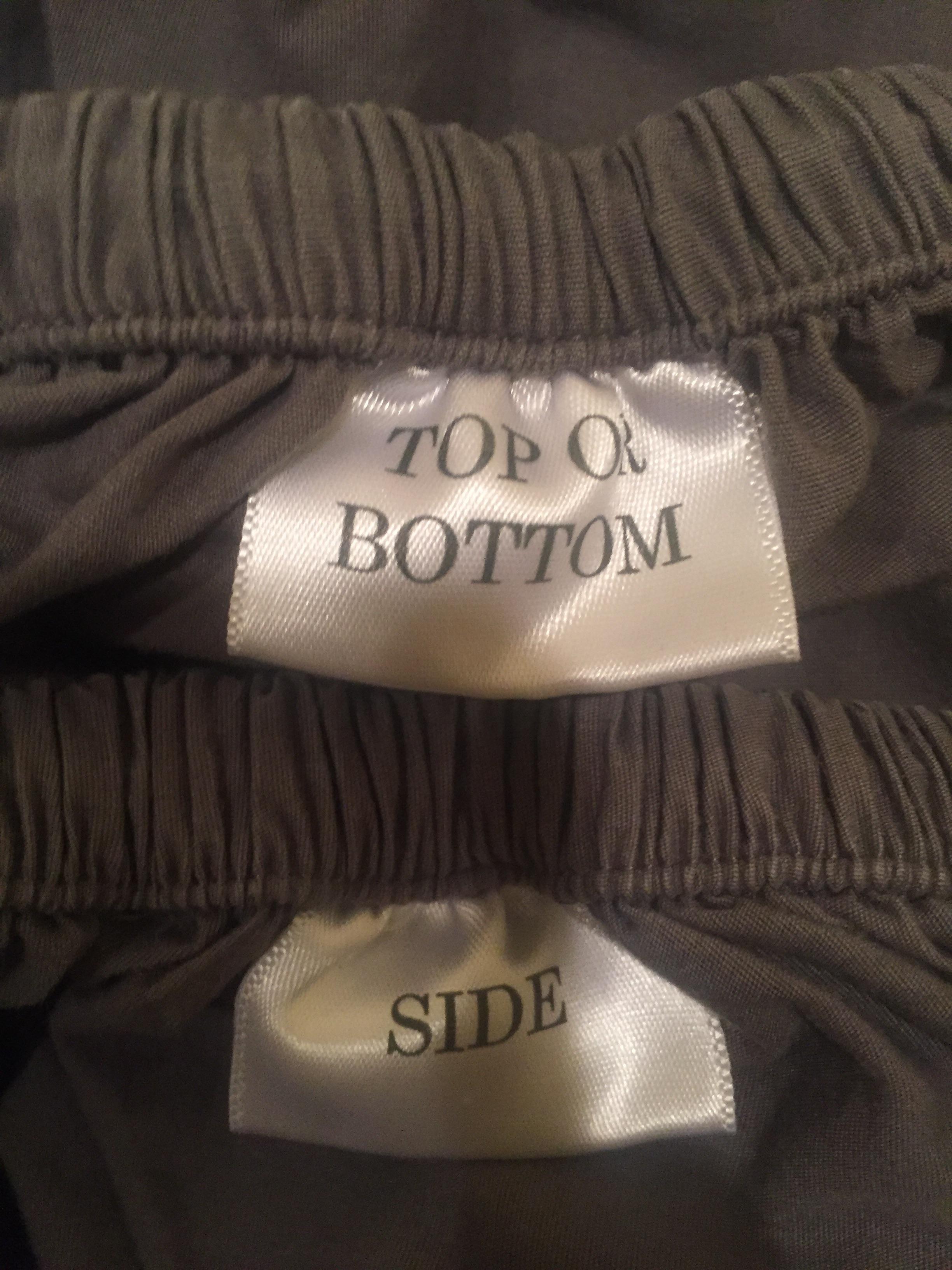 Fitted sheet indicates on each side if it's "top or bottom" or "side