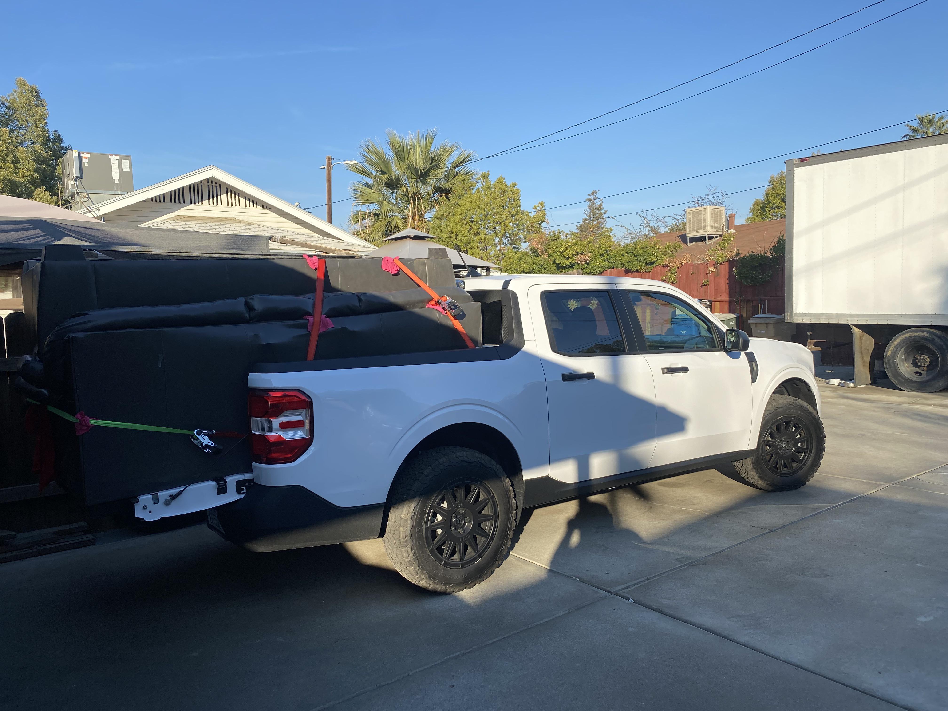 Ford Maverick coming in handy when getting rid of the old sofas. r