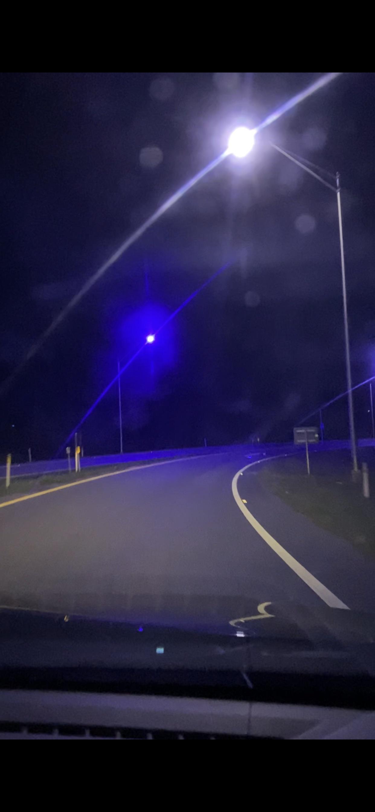 Purple lights popping up on the highway. Can’t be “faulty” white lights