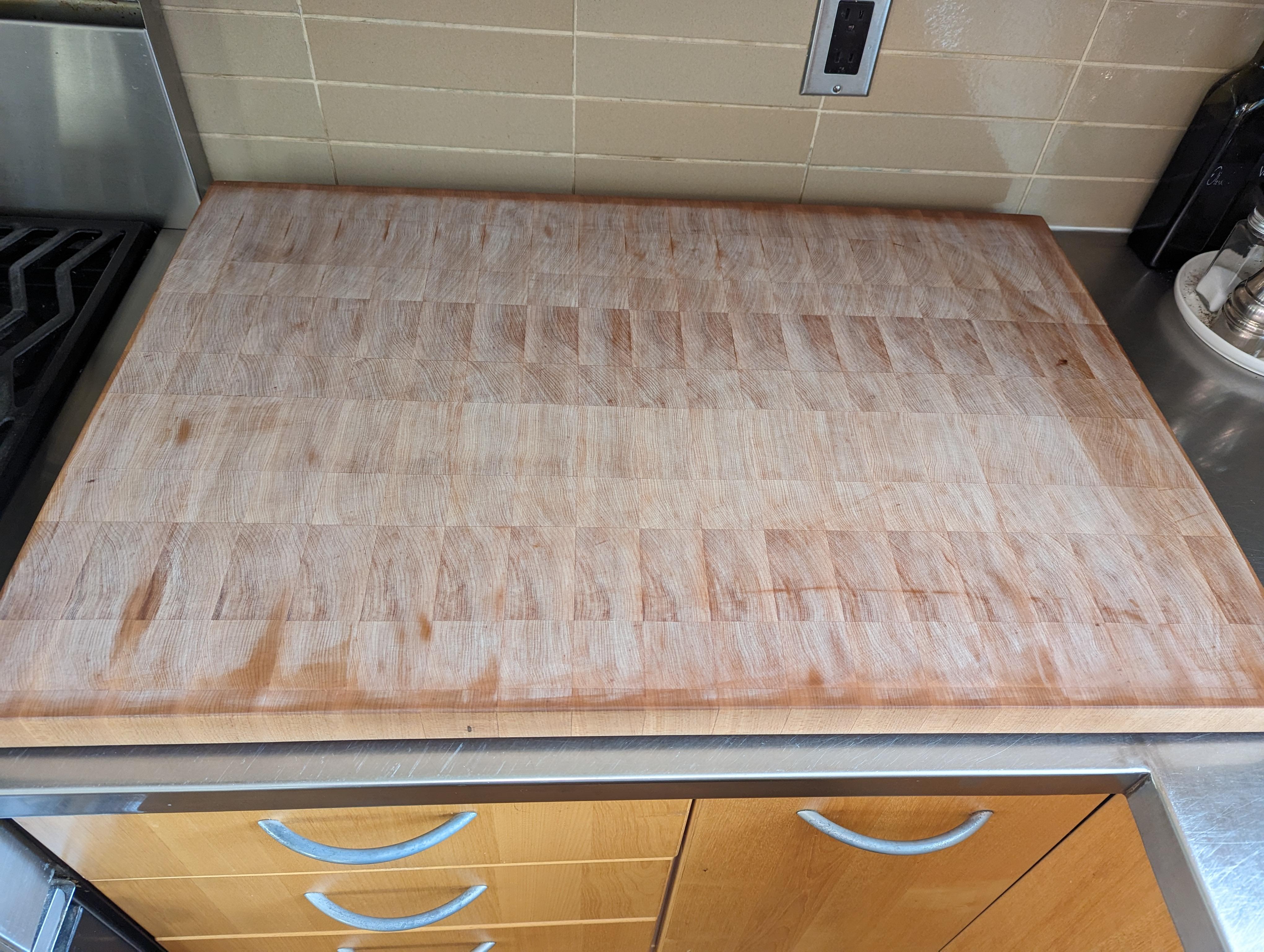 Sanded an oiled (mineral oil) end grain maple cutting board. Washed