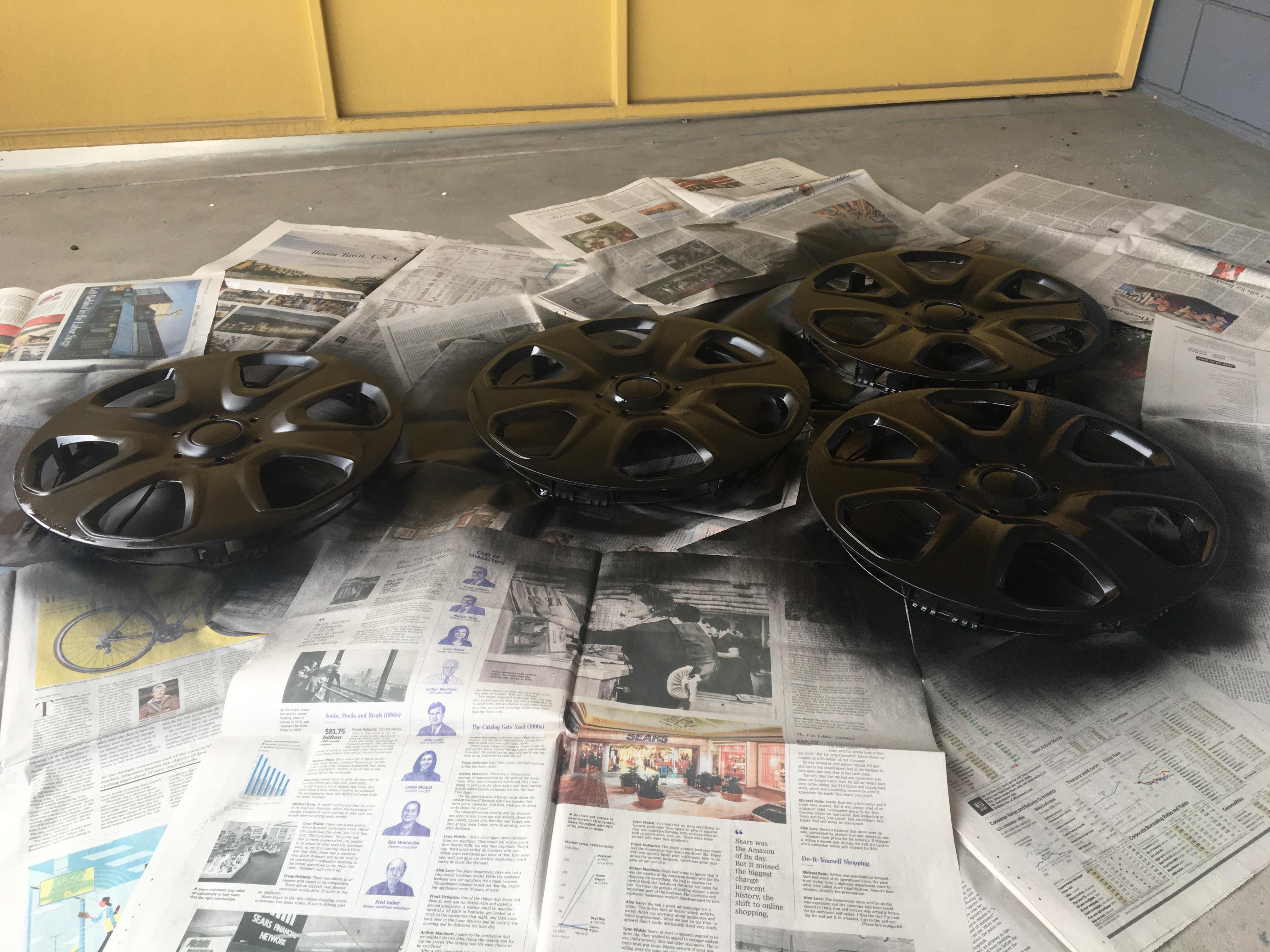 Good day to retouch on hub cap paint job ! Focus S 5 speed 2017 r