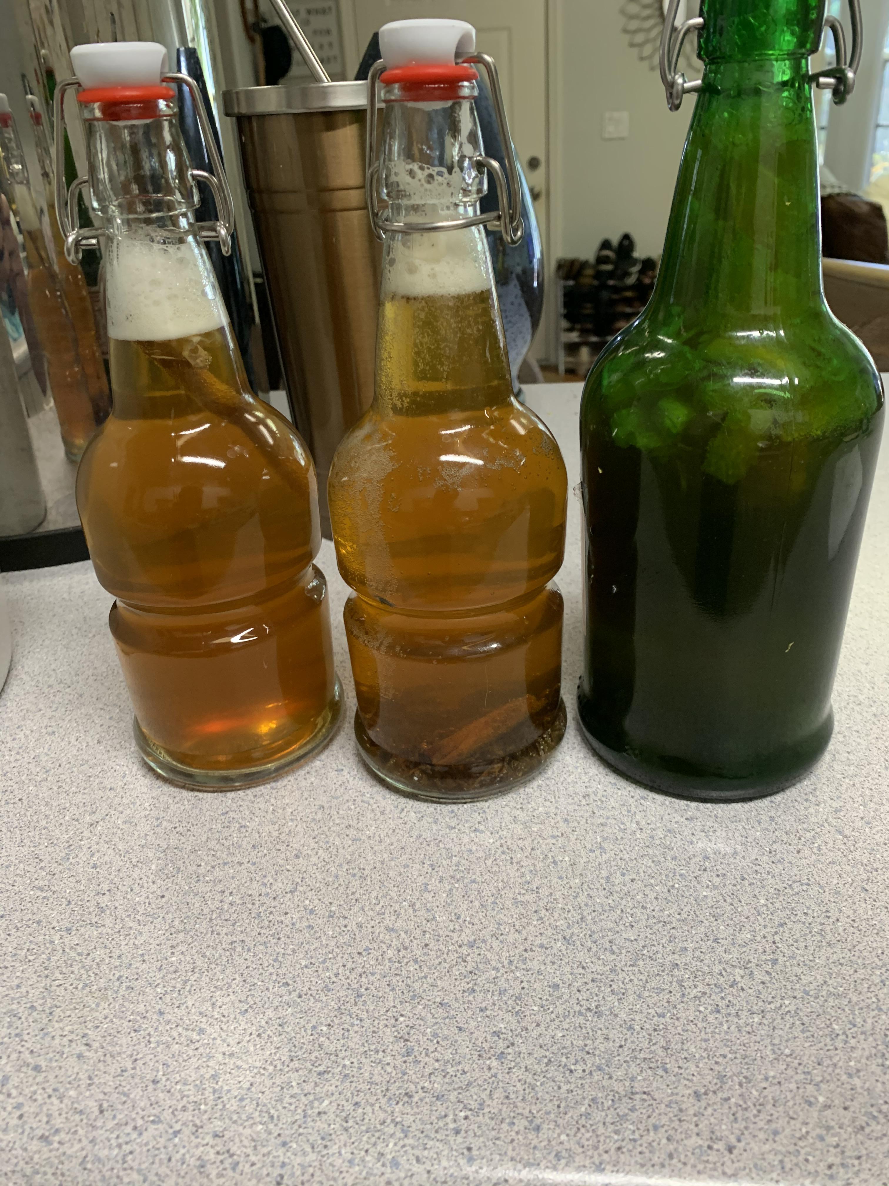 Bottling kombucha from left to right Horchata, Cinnamon Raisin cookie