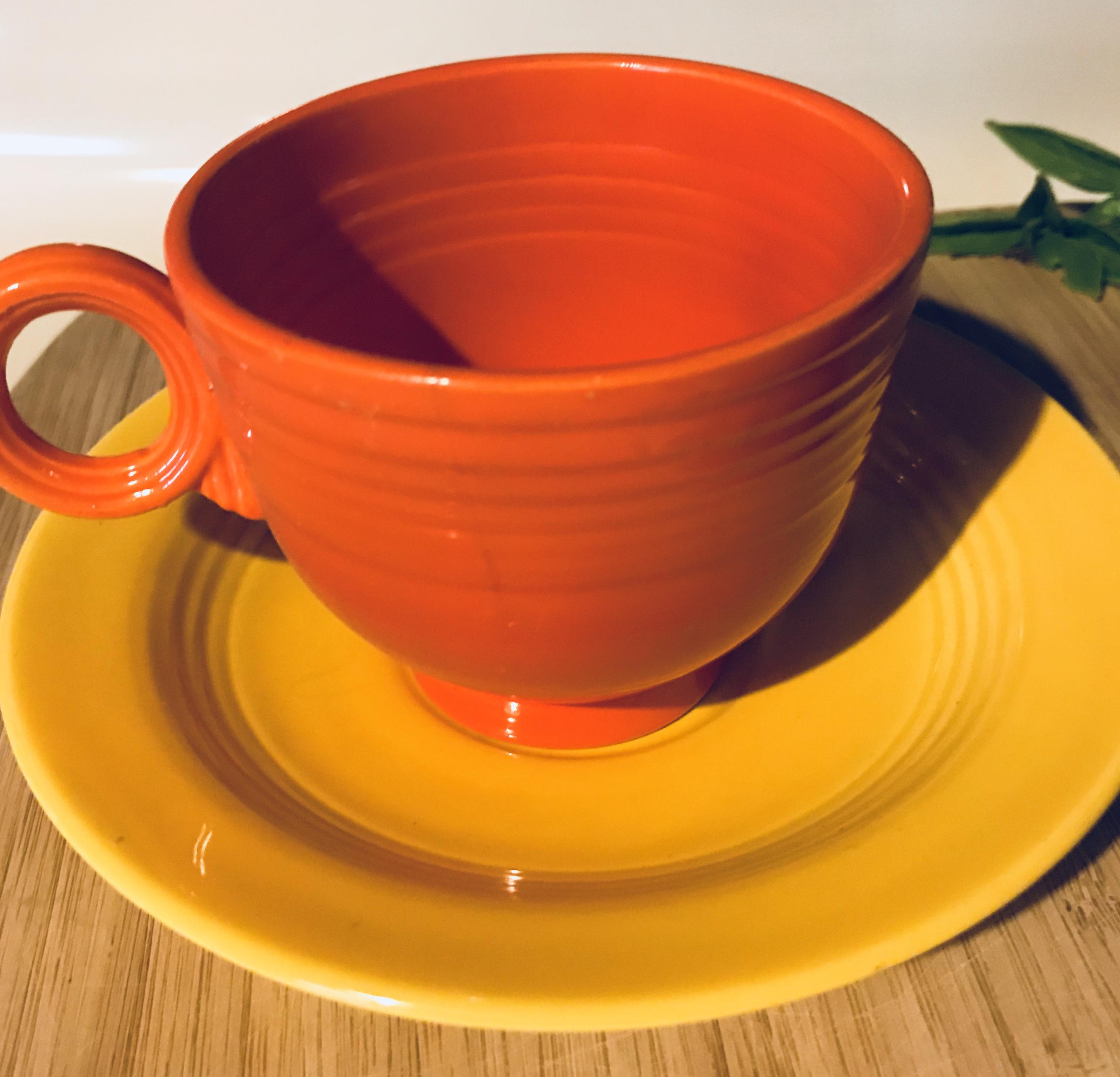 Original red tea cup with sunflower yellow saucer r/Fiestaware