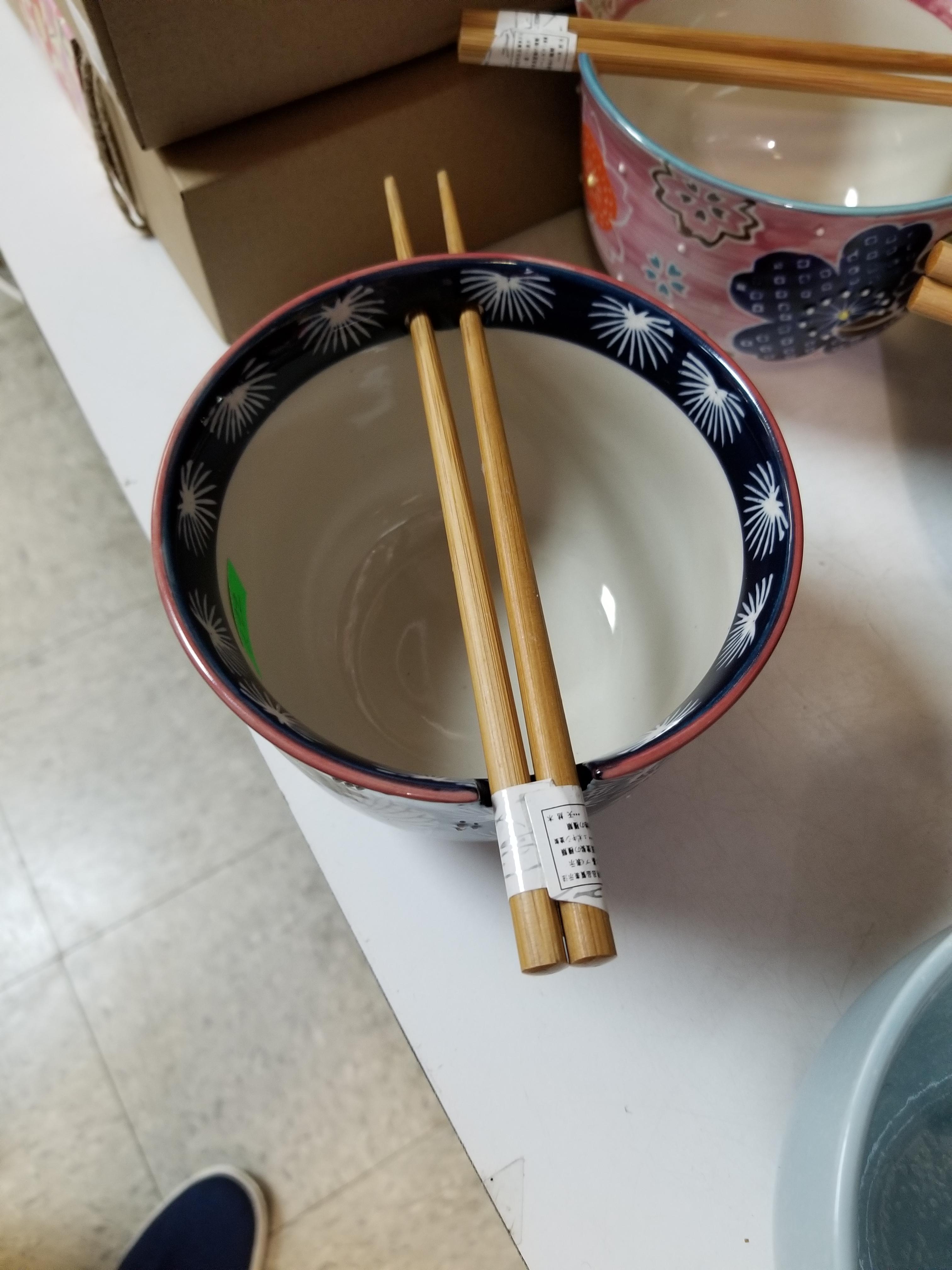 This chinese bowl has holes and a ridge for your chopsticks r