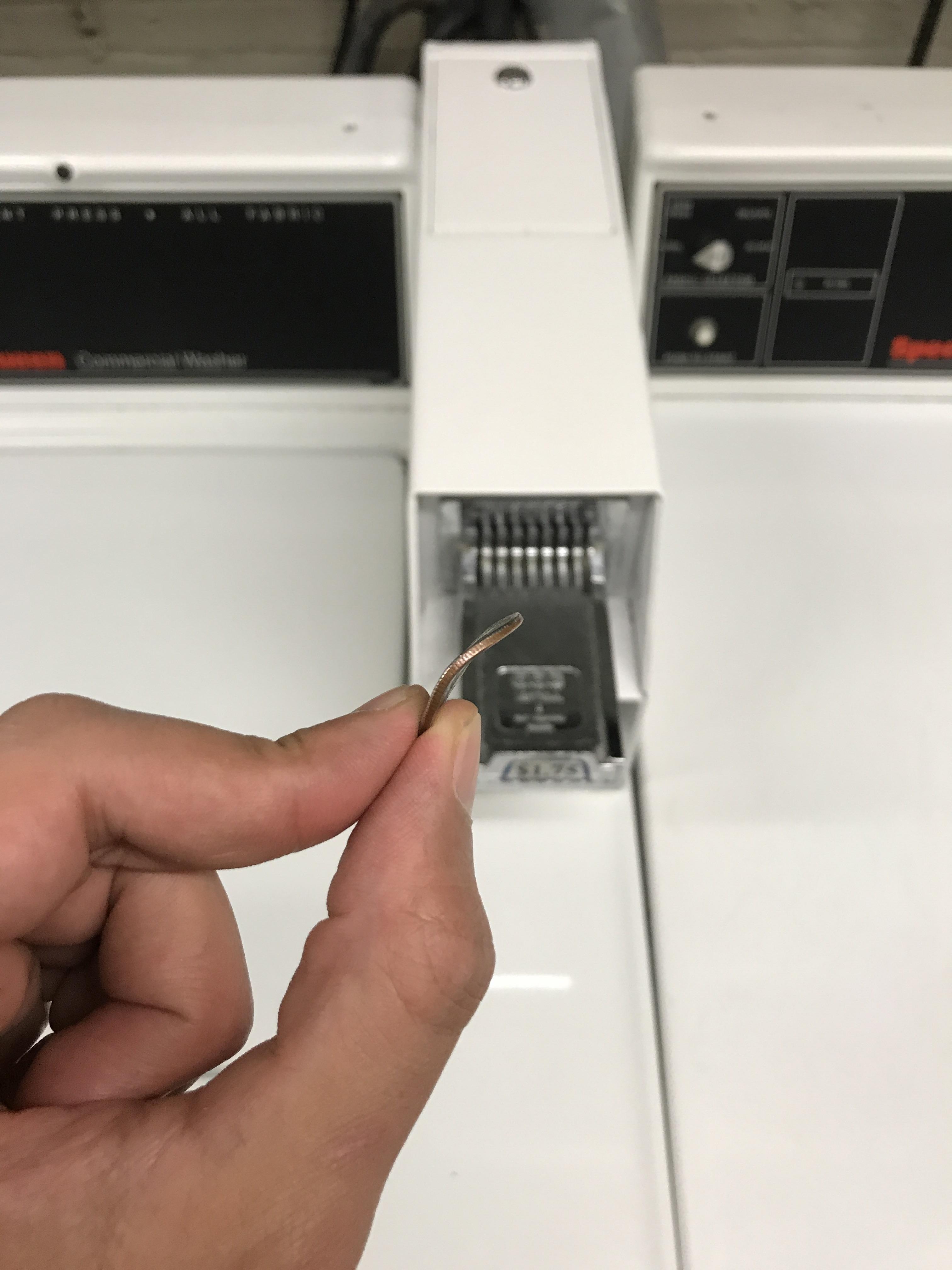 Laundry machine won't accept my bent quarter. r/mildlyinteresting