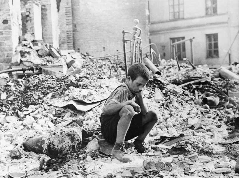 Polish boy in the ruins of Warsaw, in the aftermath of the German bombing of the city during the